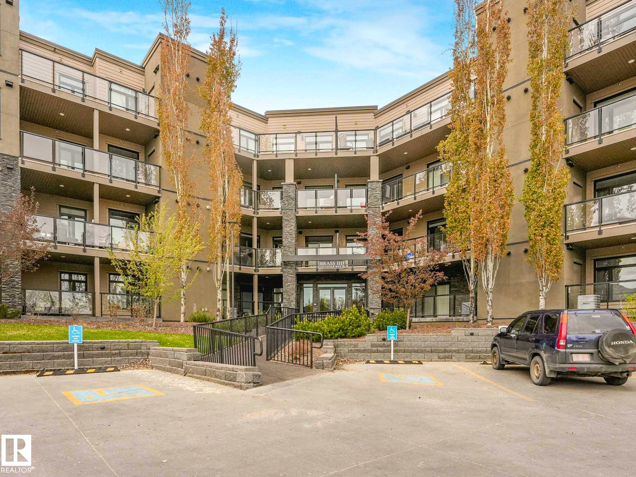 Image quality insufficient for description - 213 625 Leger Way, Edmonton, AB - Outdoor With Balcony