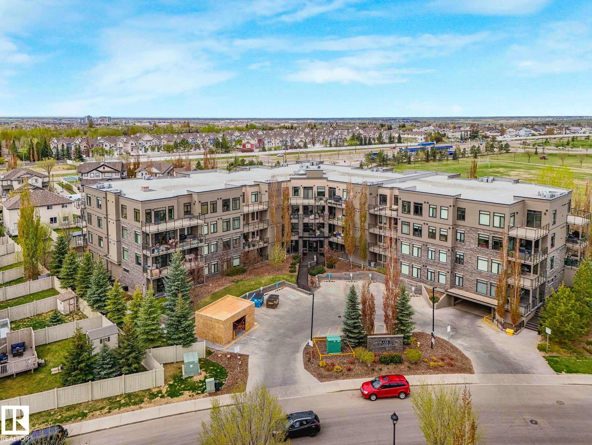 Image quality insufficient for description - 213 625 Leger Way, Edmonton, AB - Outdoor With Balcony