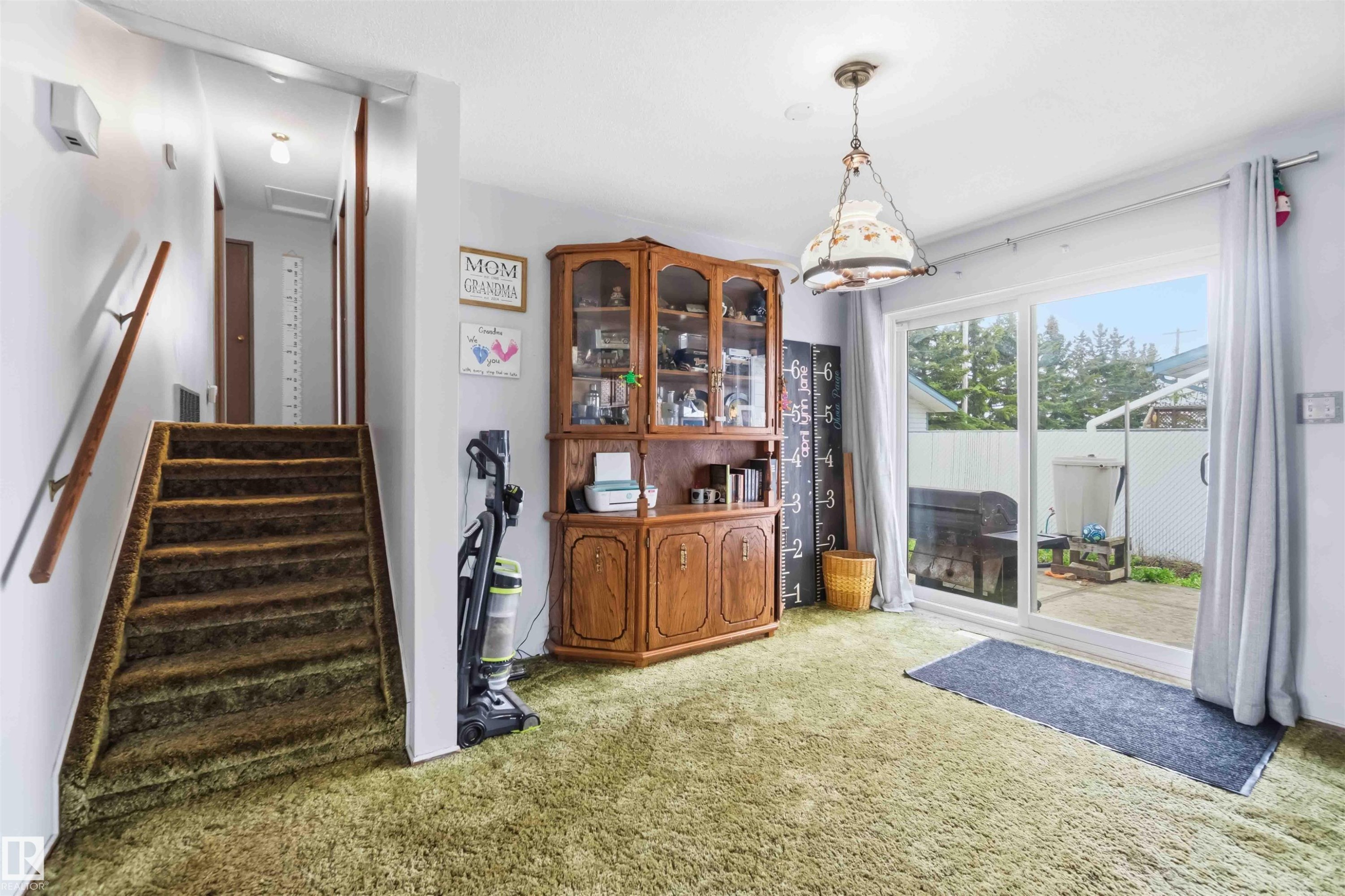 5437 49 Avenue, Andrew, AB - Indoor Photo Showing Other Room With Fireplace