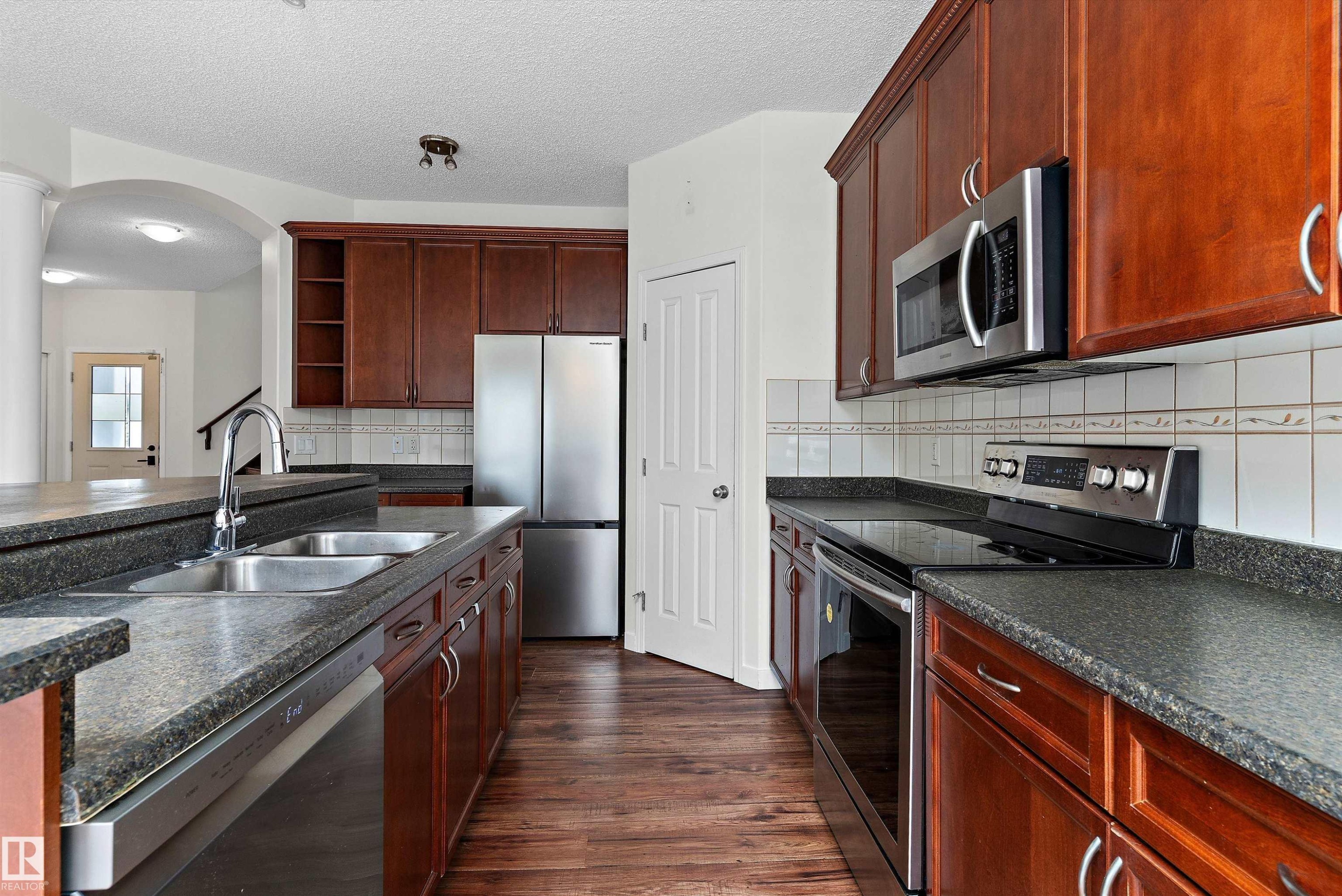 583 Leger Way, Edmonton, AB - Indoor Photo Showing Kitchen With Double Sink
