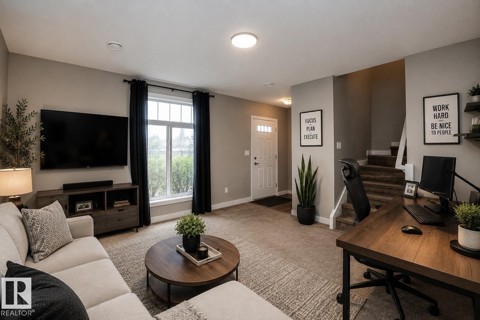 Open-concept living area with neutral wall tones and carpeted flooring - 117 Callaghan Drive Sw, Edmonton, AB - Indoor Photo Showing Living Room