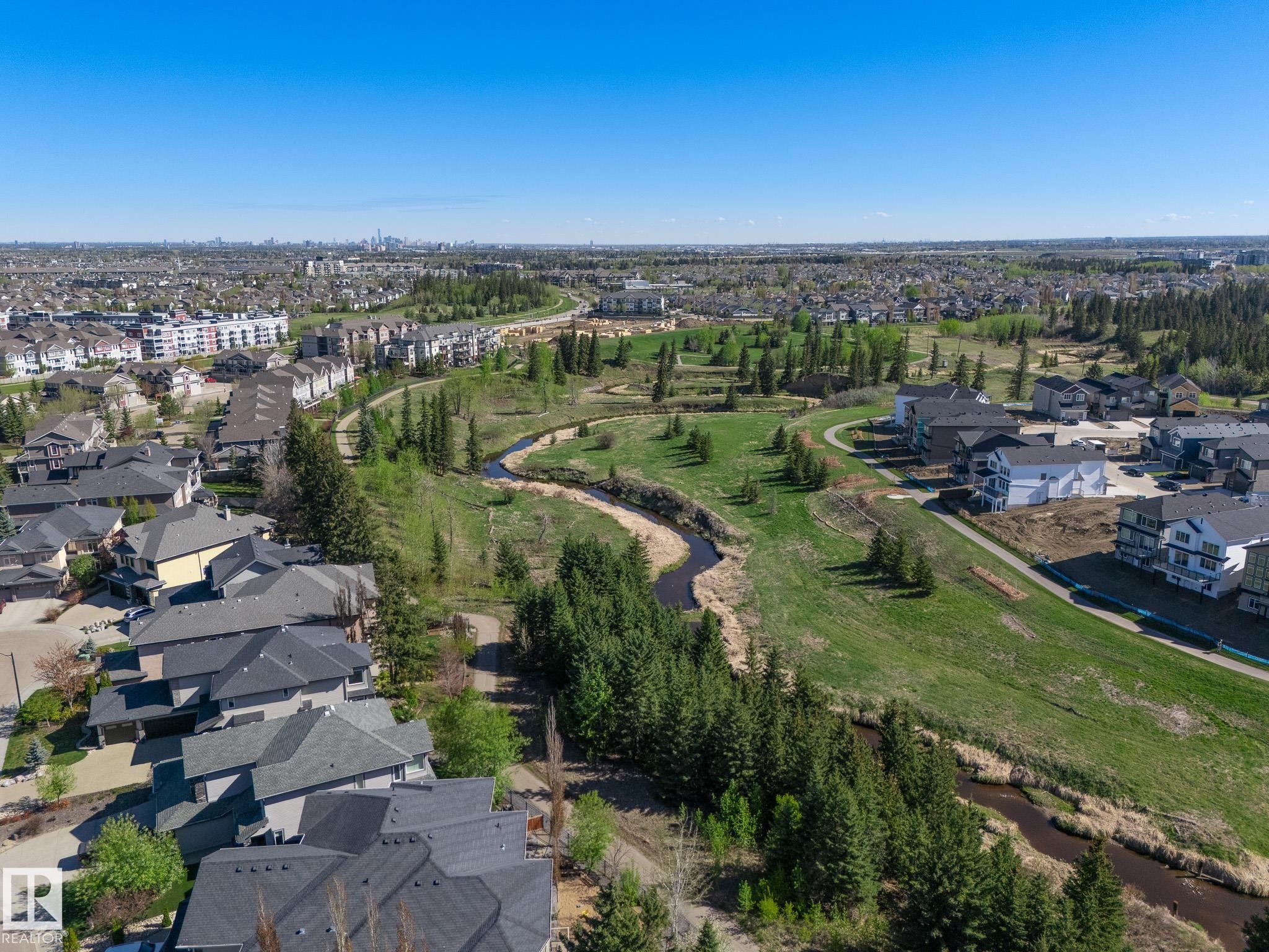 Expansive community featuring single-family homes and multi-story residences - 117 Callaghan Drive Sw, Edmonton, AB - Outdoor With View