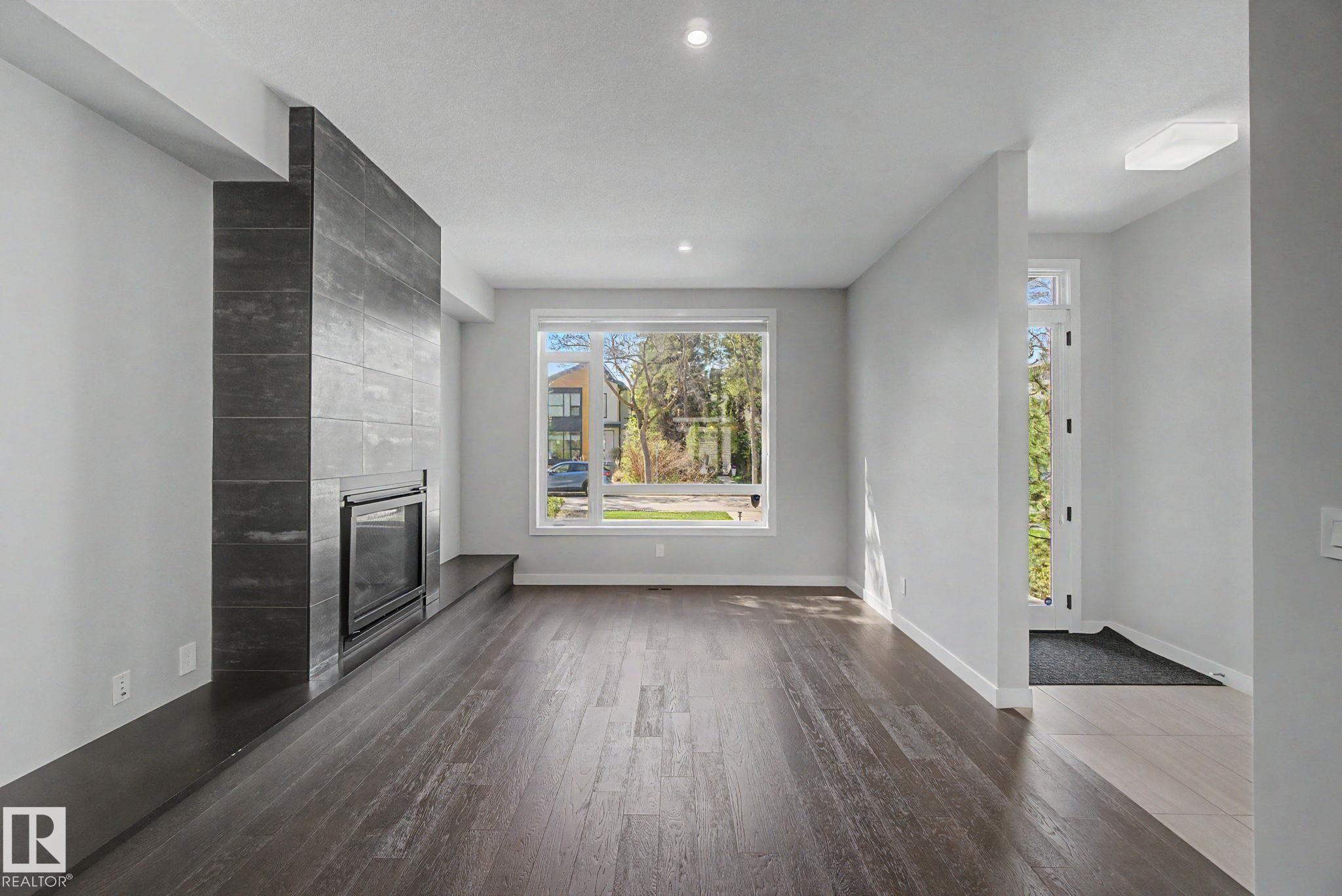 11430 75 Avenue, Edmonton, AB - Indoor Photo Showing Other Room With Fireplace