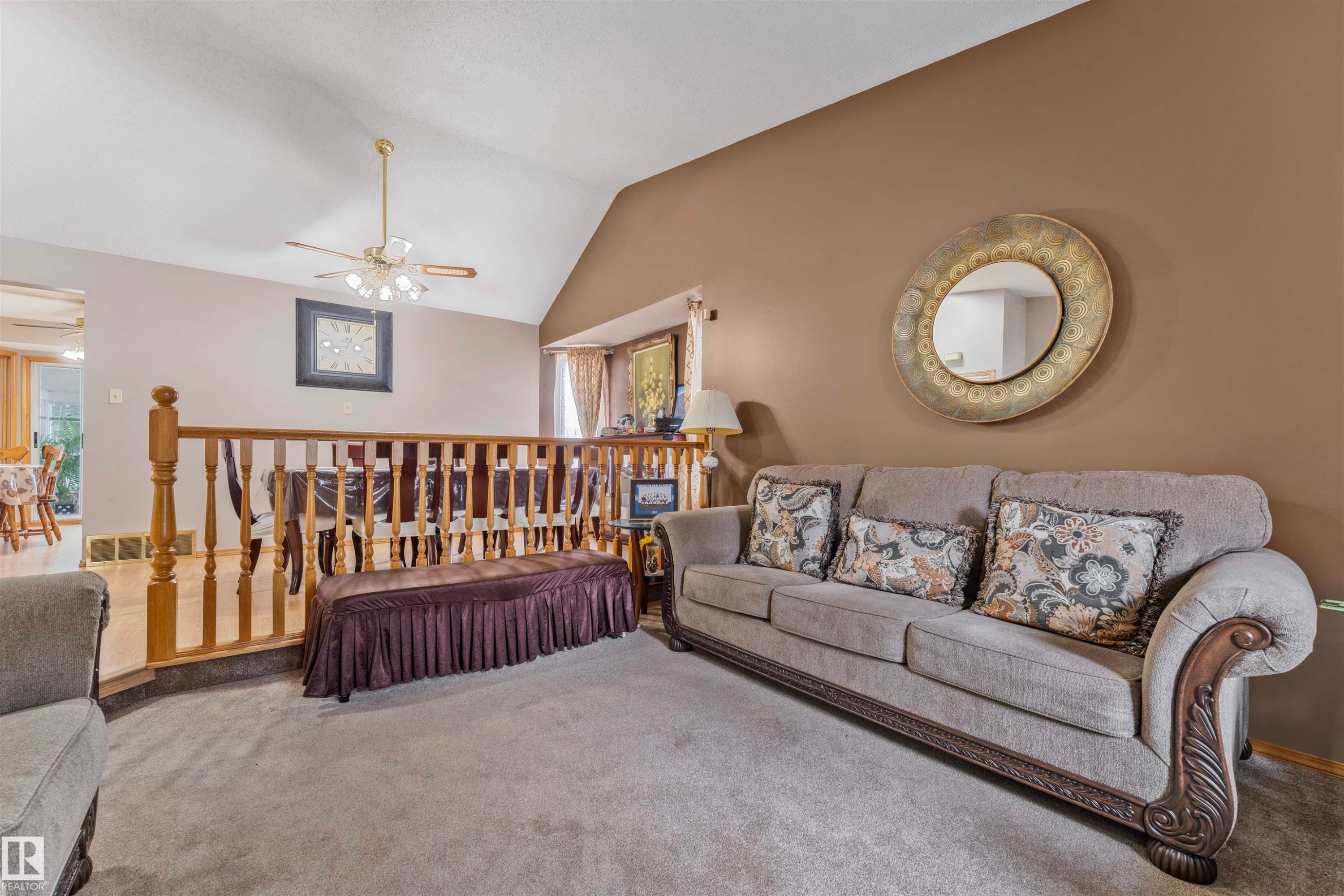 Vaulted ceiling with a ceiling fan light fixture - 4231 32 Avenue, Edmonton, AB - Indoor Photo Showing Living Room