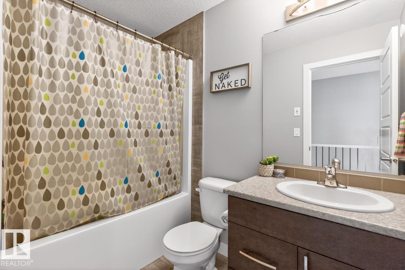 Upstairs 4 Piece Bathroom featuring Shower Tub Combo. - 20023 17A Avenue, Edmonton, AB - Indoor Photo Showing Bathroom