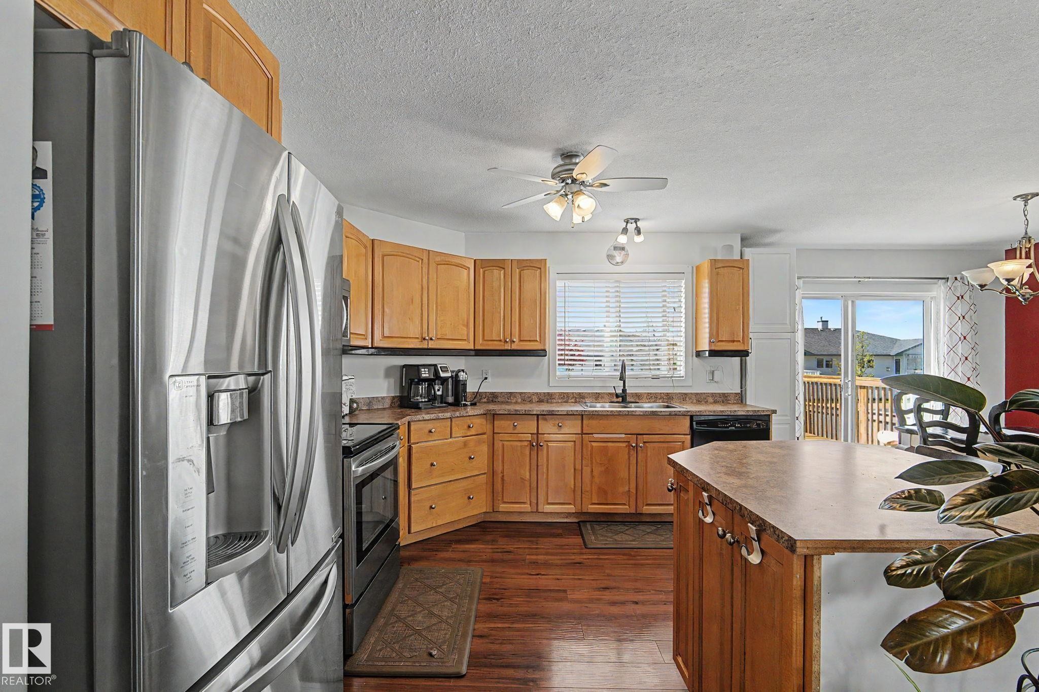 7565 165A Avenue, Edmonton, AB - Indoor Photo Showing Kitchen With Double Sink