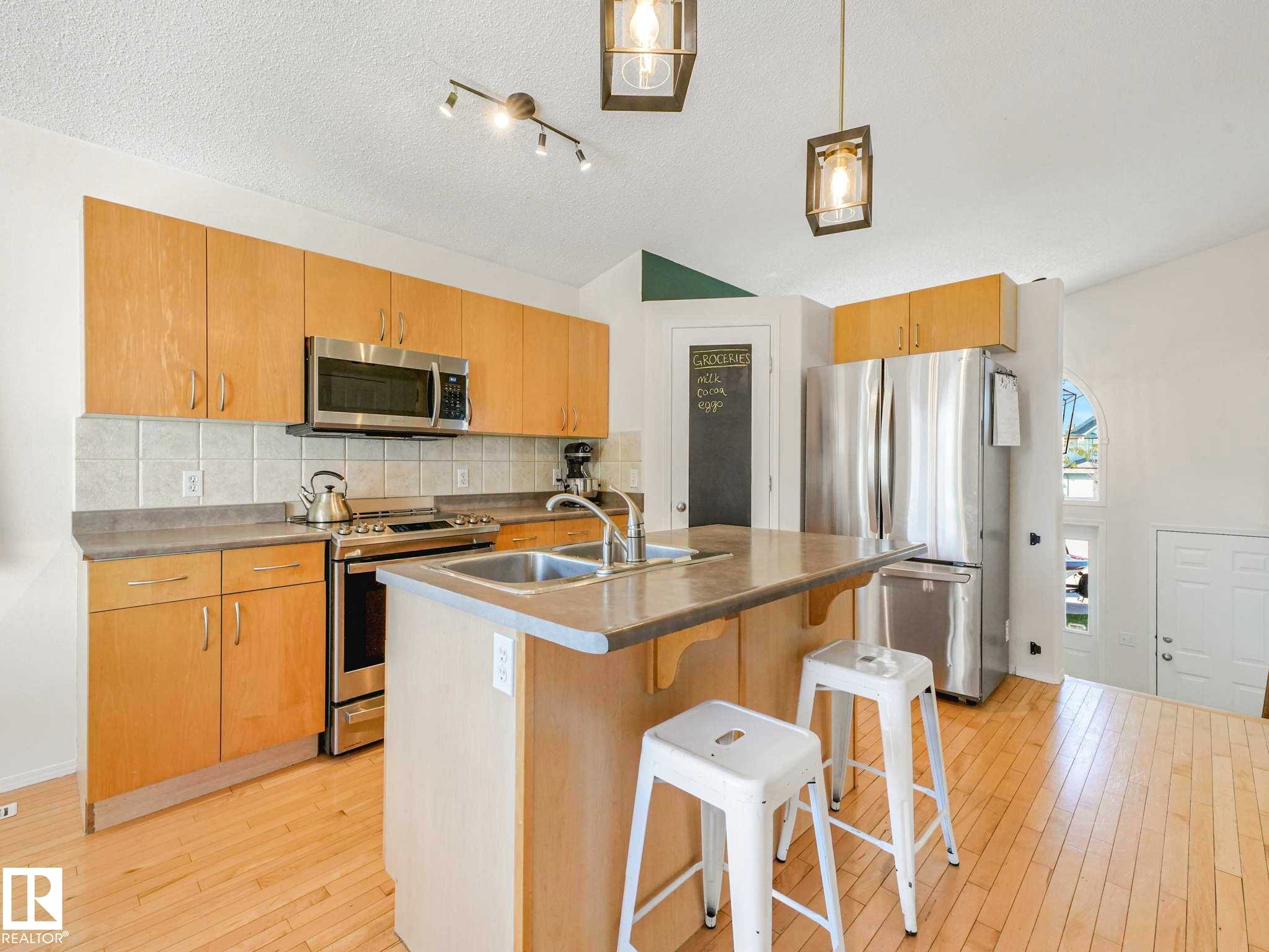 3608 130 Avenue, Edmonton, AB - Indoor Photo Showing Kitchen With Stainless Steel Kitchen With Double Sink
