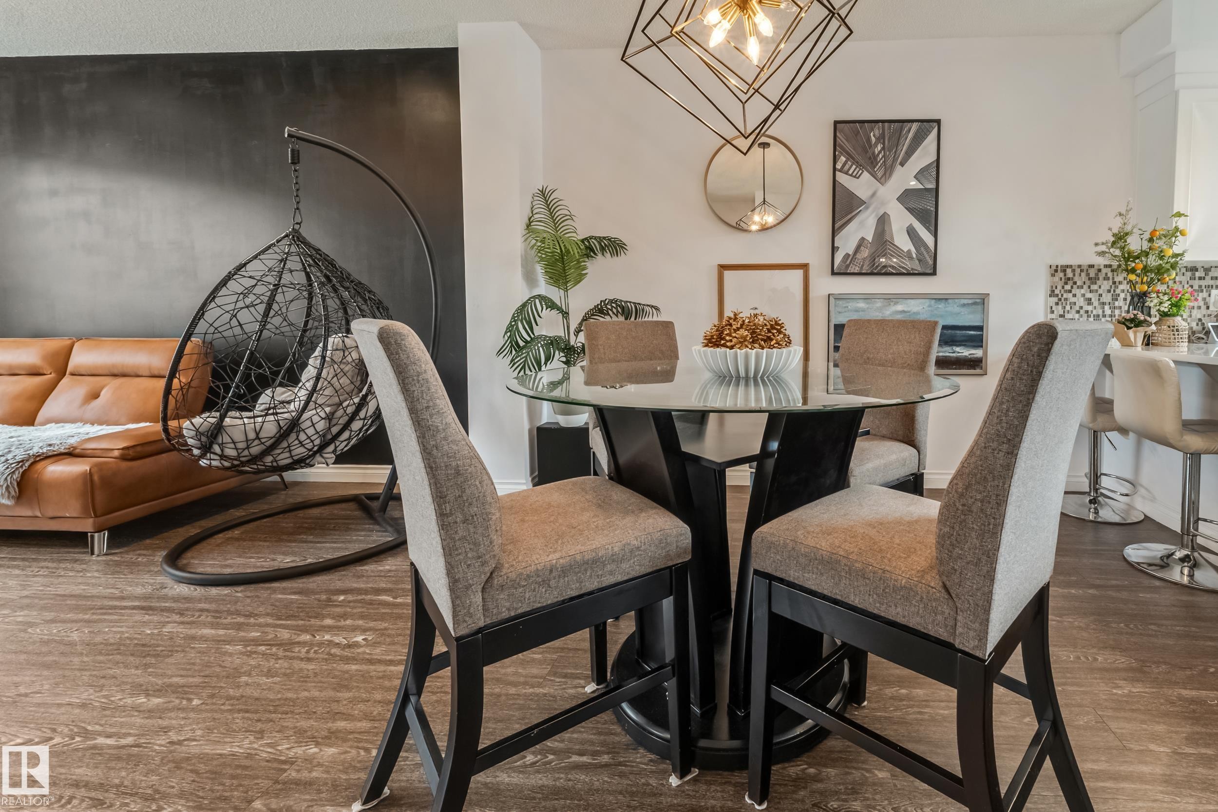 Open concept interior featuring wood-finish flooring - 8131 Chappelle Way, Edmonton, AB - Indoor Photo Showing Dining Room