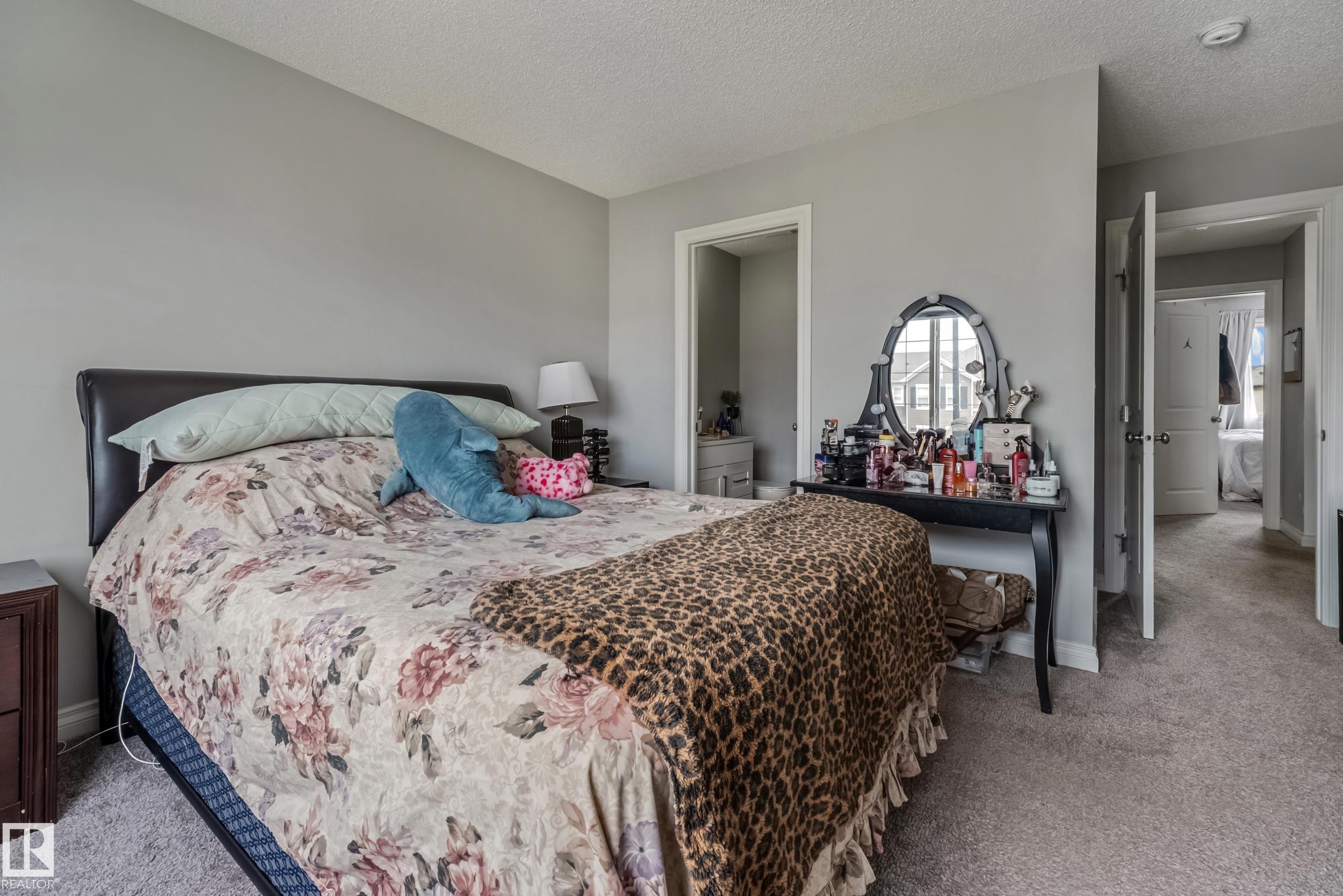 Carpeted room with light gray walls and white trim - 8131 Chappelle Way, Edmonton, AB - Indoor Photo Showing Bedroom