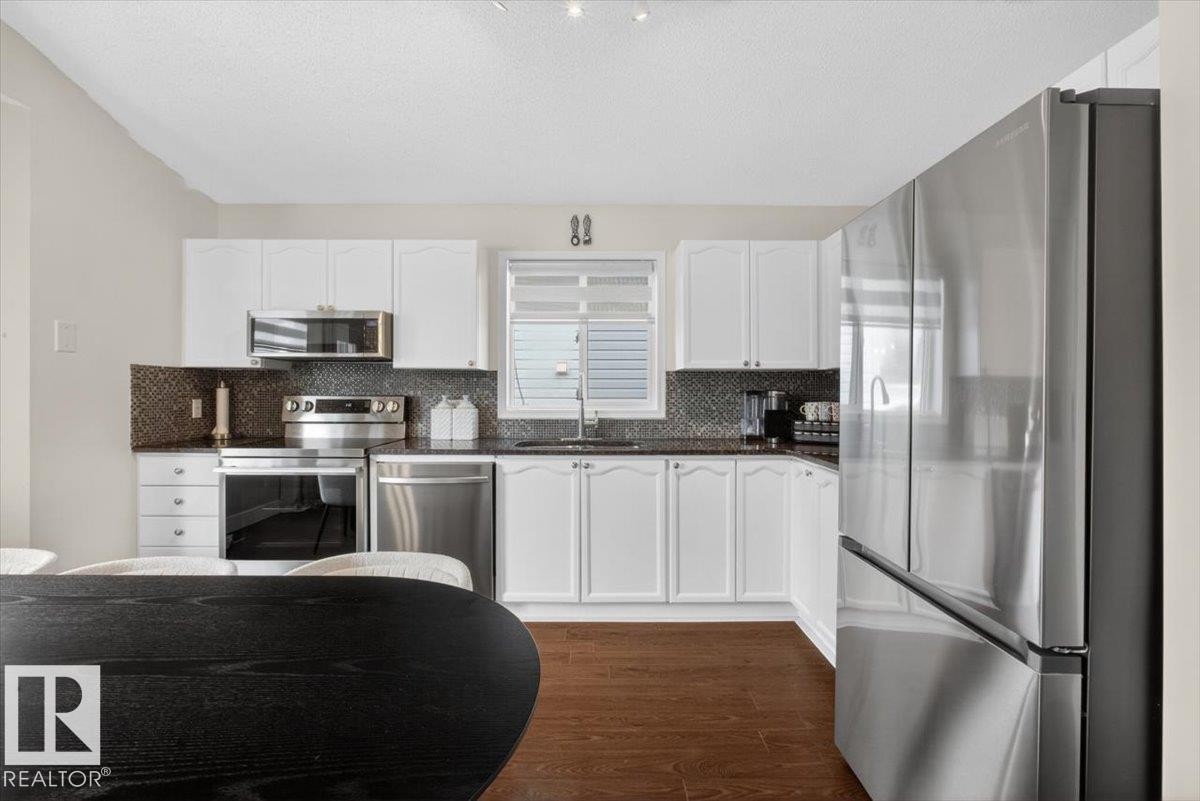 18520 77 Avenue, Edmonton, AB - Indoor Photo Showing Kitchen With Stainless Steel Kitchen With Upgraded Kitchen