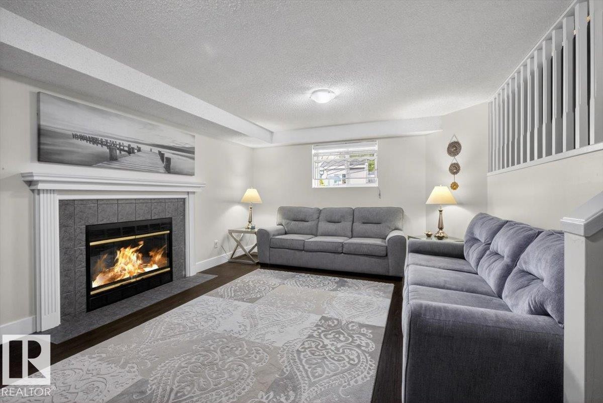 18520 77 Avenue, Edmonton, AB - Indoor Photo Showing Living Room With Fireplace