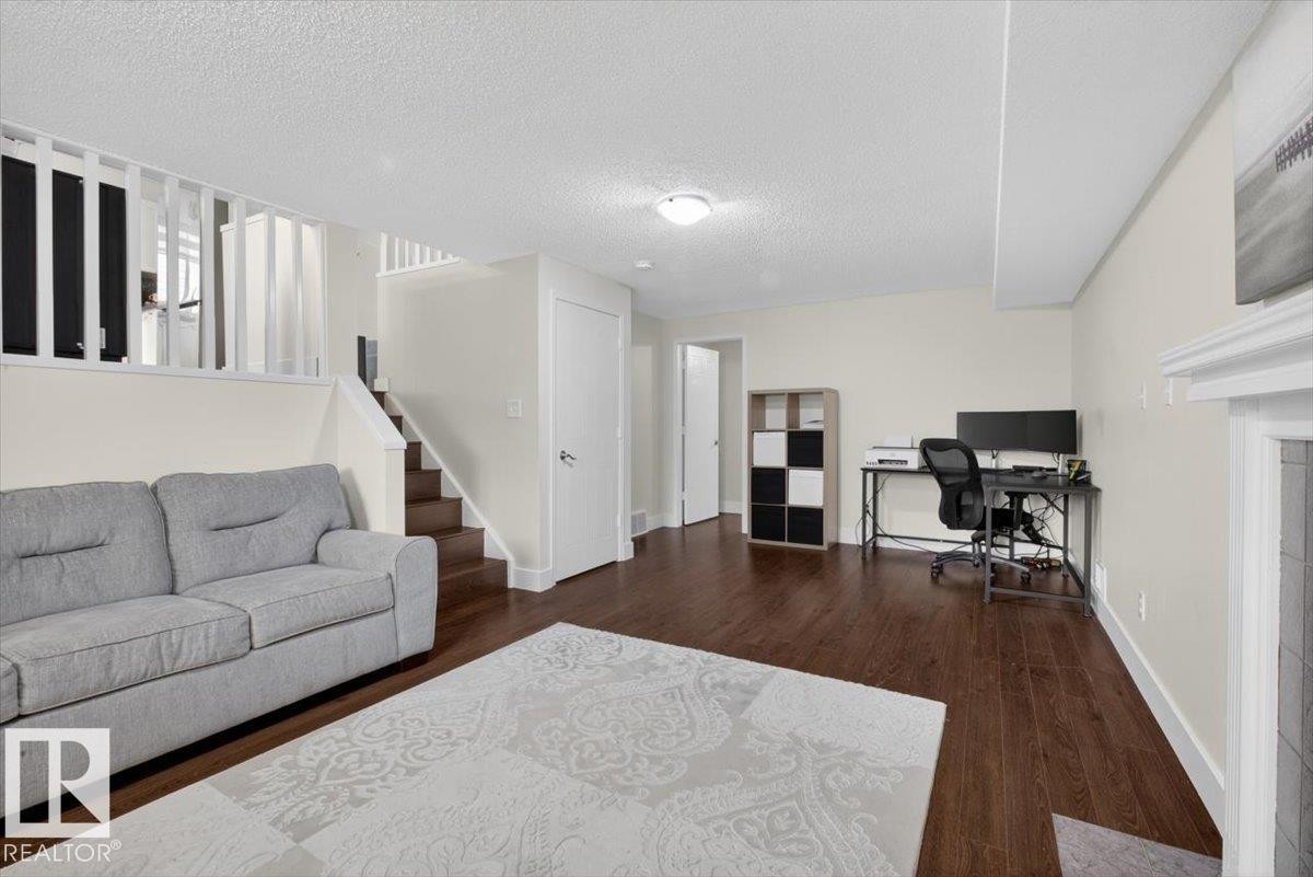 18520 77 Avenue, Edmonton, AB - Indoor Photo Showing Living Room With Fireplace