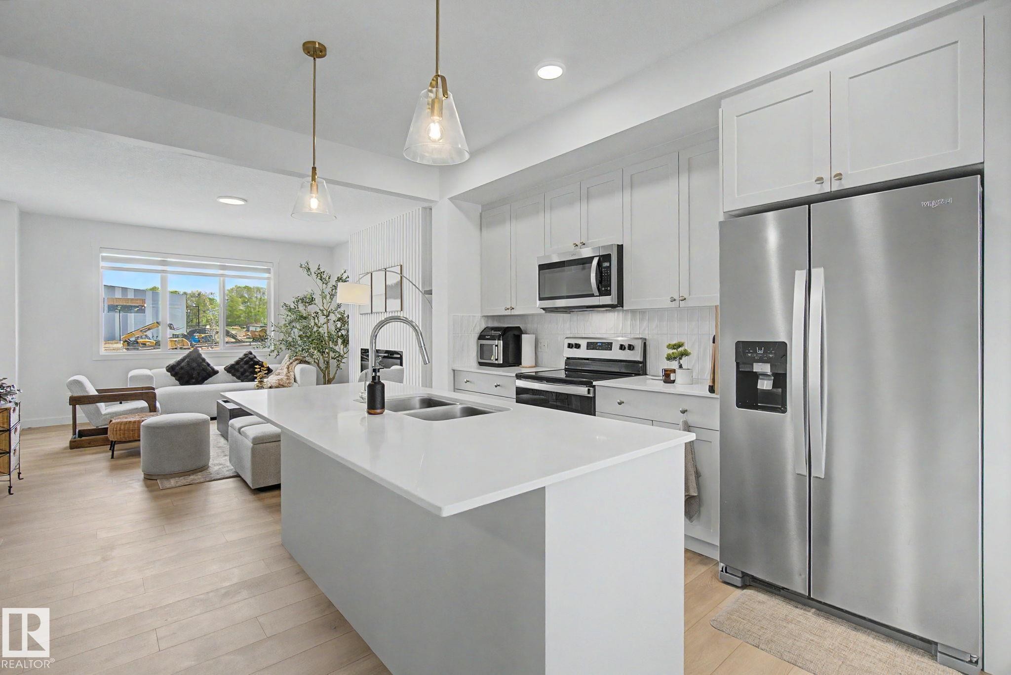 117 Brickyard Drive, Stony Plain, AB - Indoor Photo Showing Kitchen With Stainless Steel Kitchen With Double Sink With Upgraded Kitchen