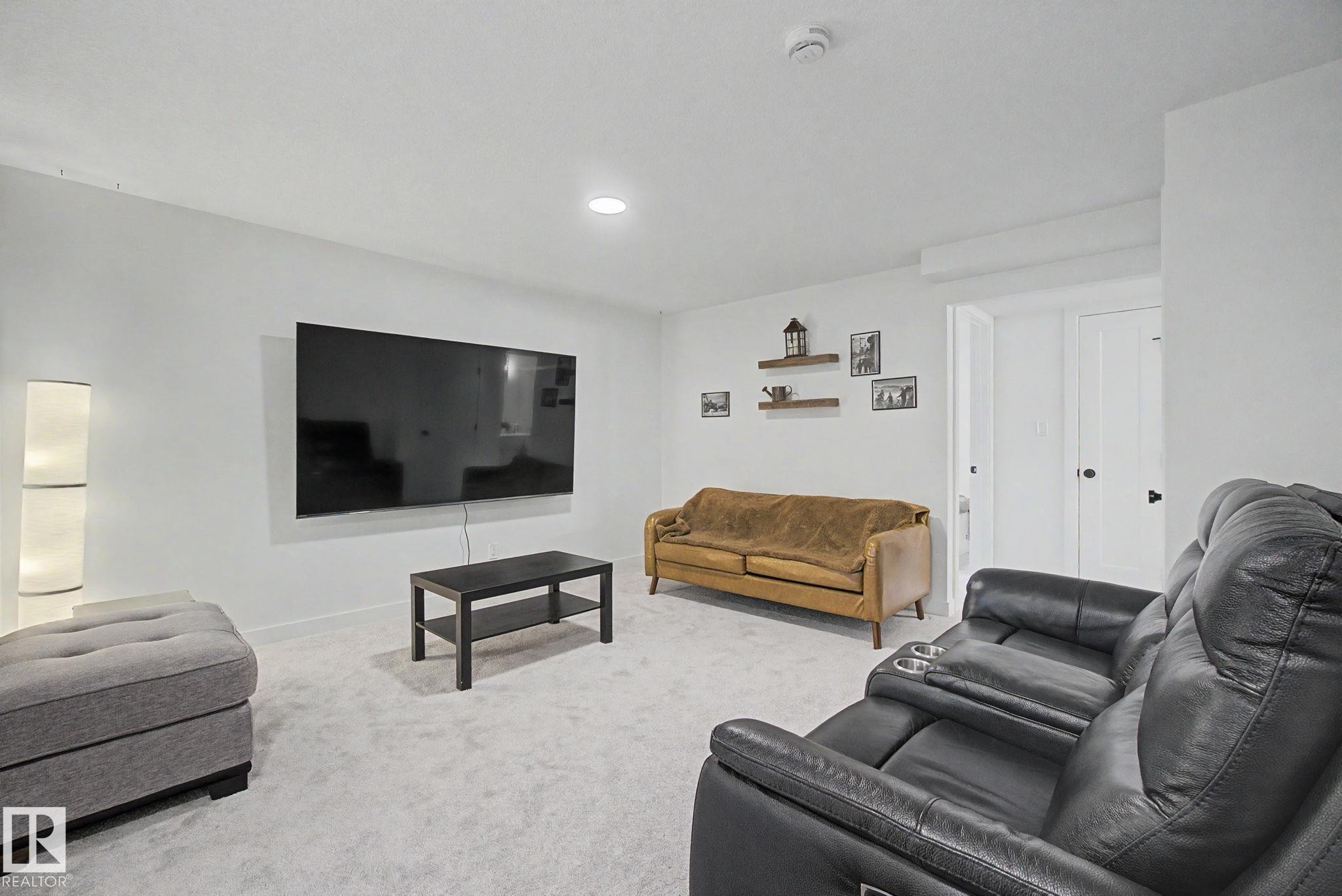117 Brickyard Drive, Stony Plain, AB - Indoor Photo Showing Living Room