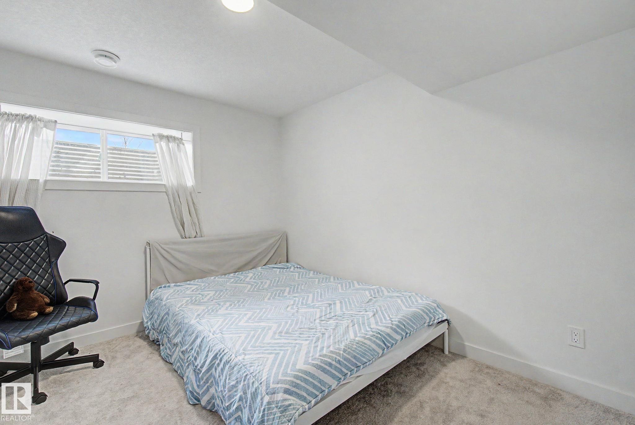 117 Brickyard Drive, Stony Plain, AB - Indoor Photo Showing Bedroom