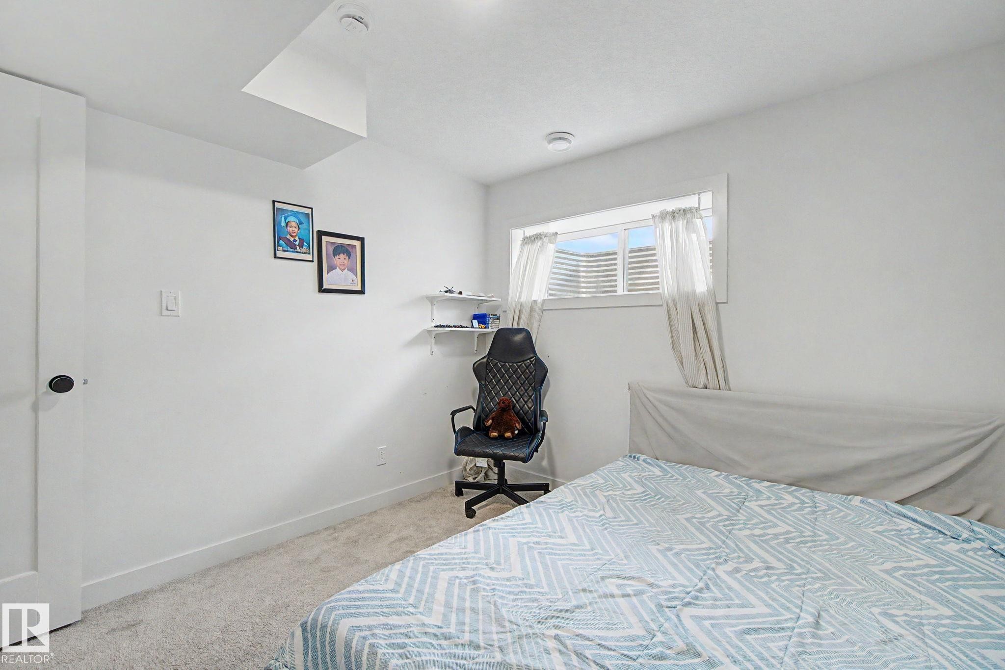 117 Brickyard Drive, Stony Plain, AB - Indoor Photo Showing Bedroom