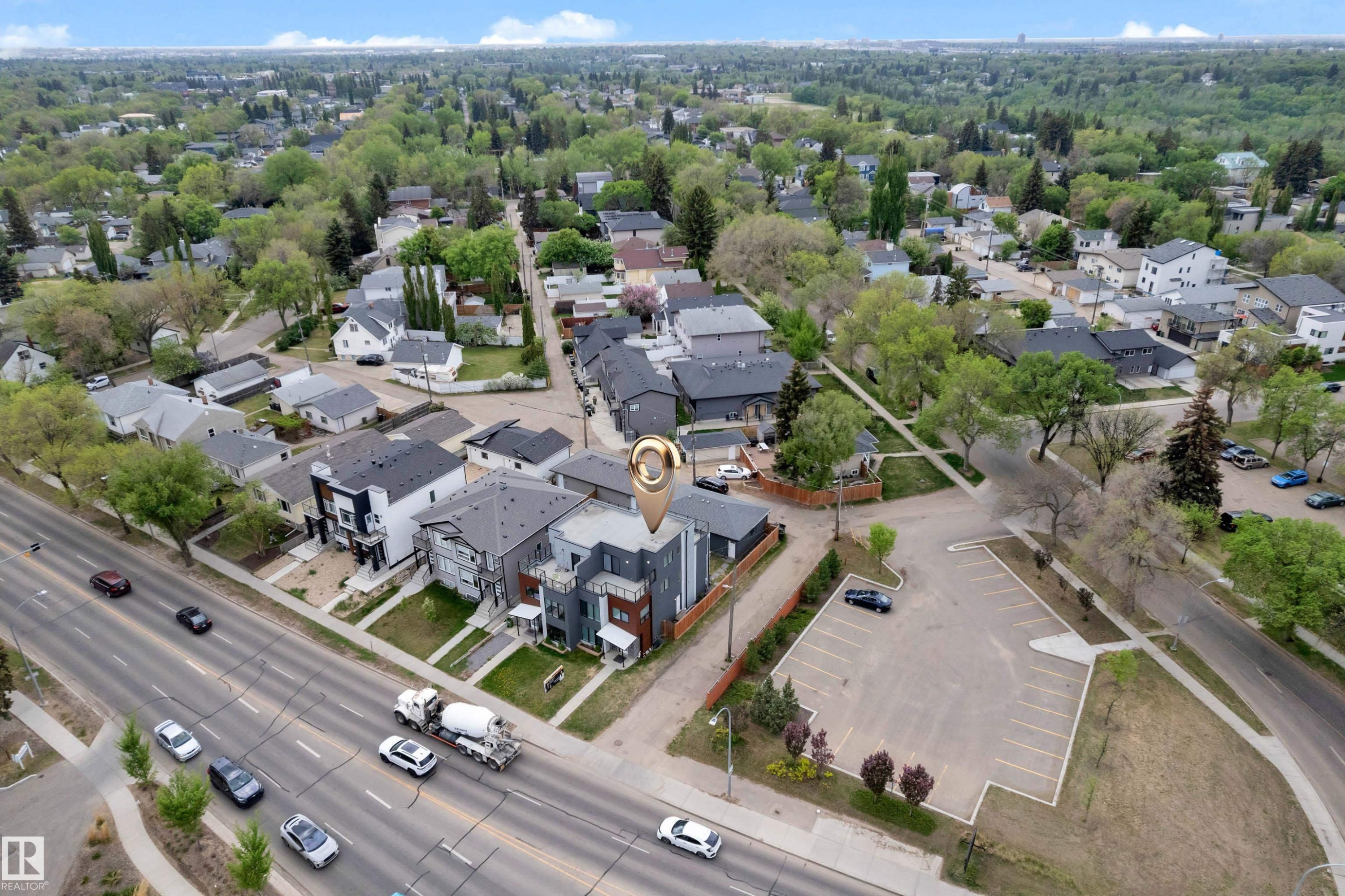 Aerial perspective showcasing a multi-story property with a dark-toned exterior - 9329 Connors Road, Edmonton, AB - Outdoor With View