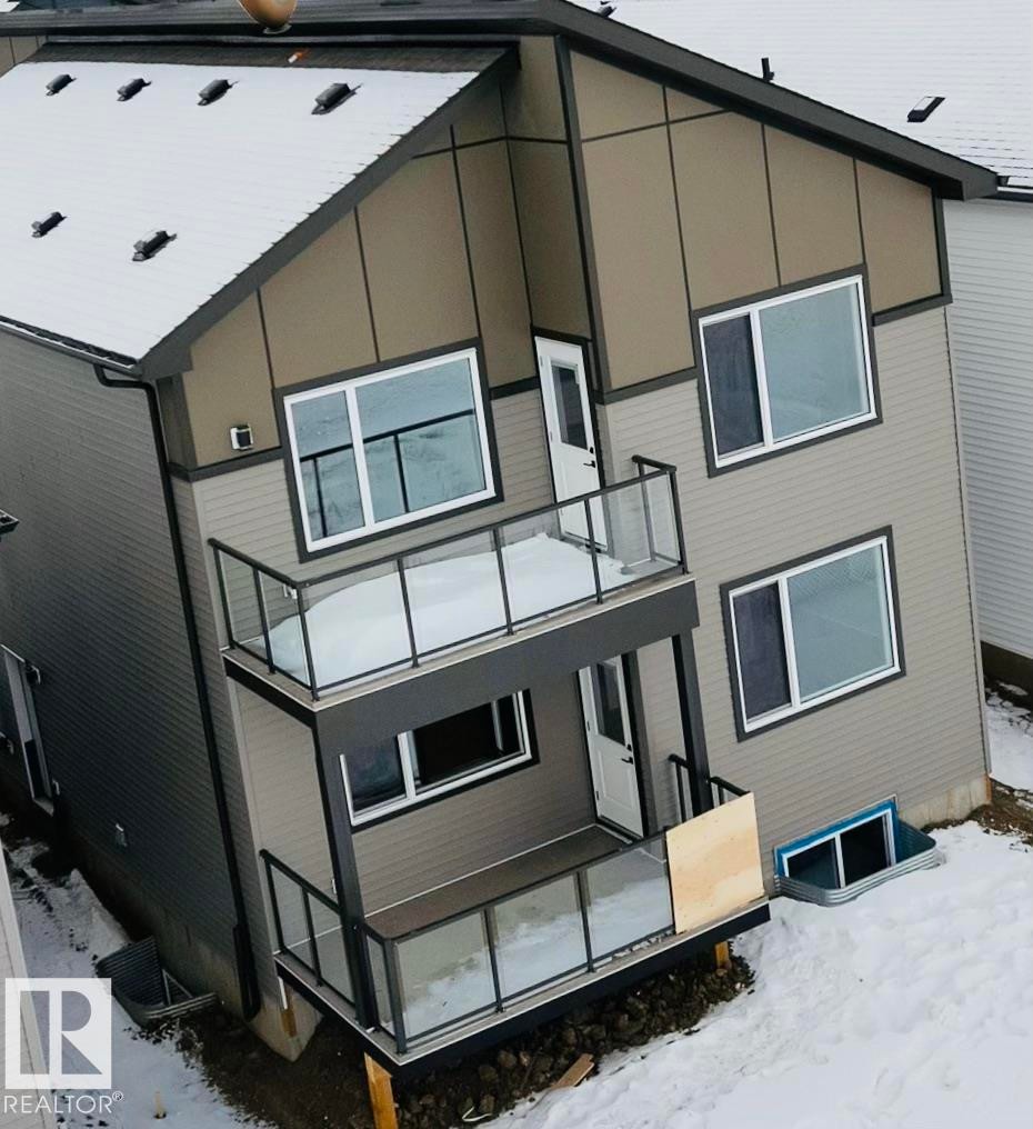 Contemporary two-story exterior featuring multi-toned siding - 2027 156 Avenue, Edmonton, AB - Outdoor With Exterior