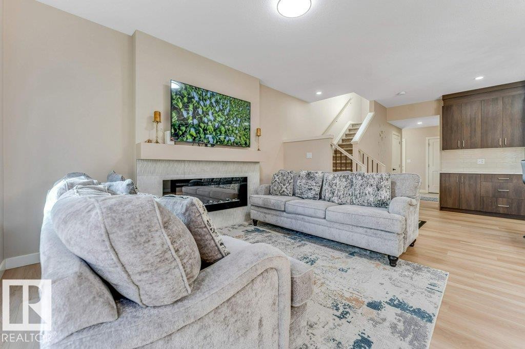 1459 Cherniak Way, Edmonton, AB - Indoor Photo Showing Living Room With Fireplace
