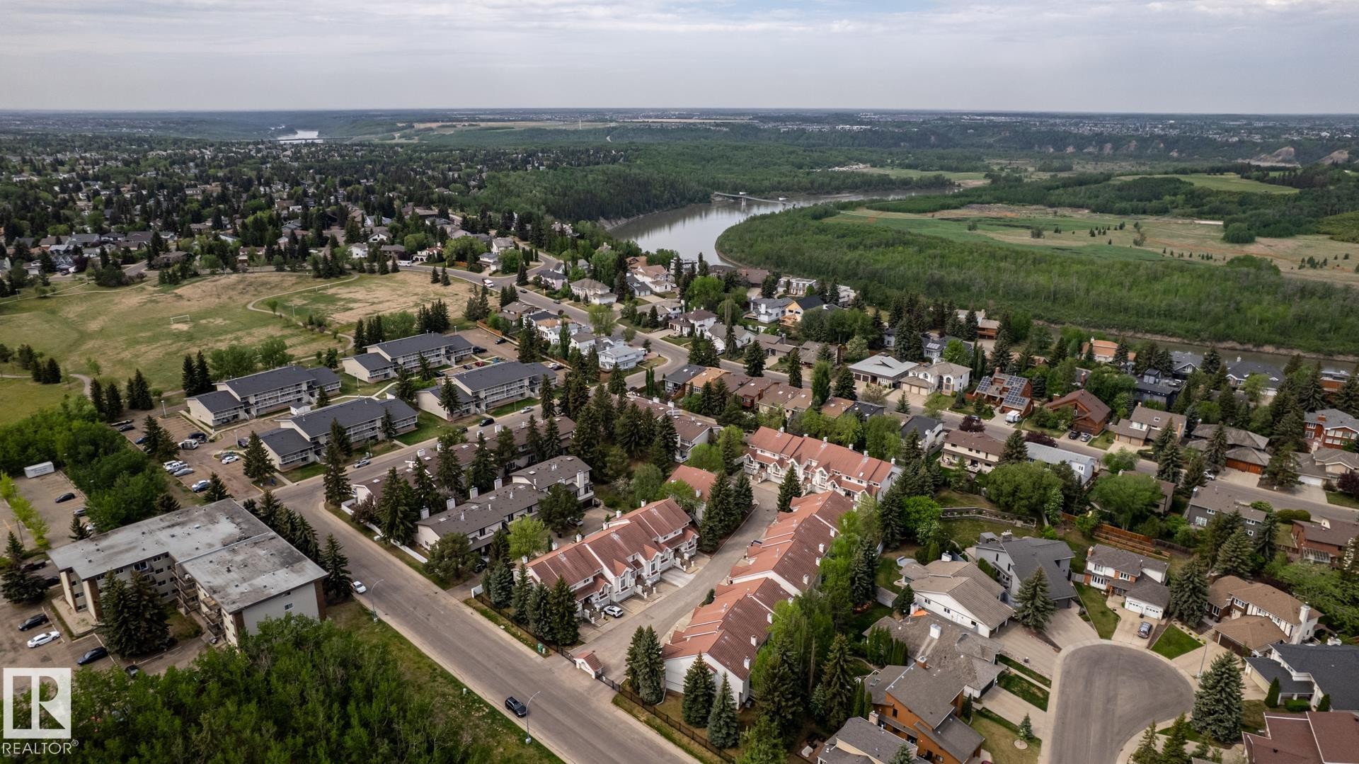 Aerial perspective showcasing a residential area with diverse property types - 4632 151 Street, Edmonton, AB - Outdoor With View
