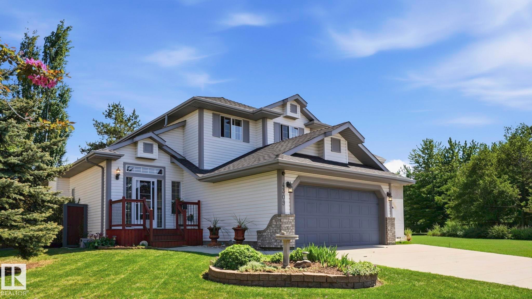 Two-story residence featuring white siding and a dark gray roof - 4309 37A Avenue, Edmonton, AB - Outdoor With Facade