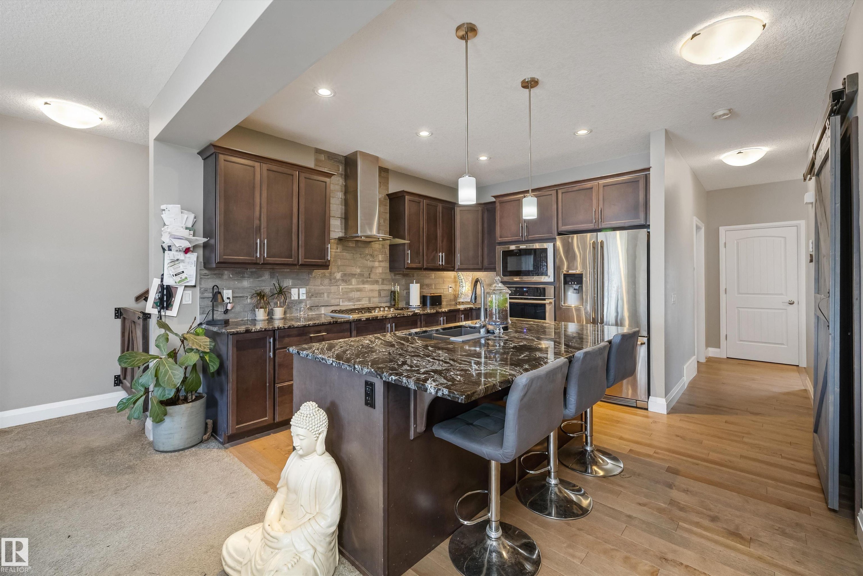 153 Sturtz Bend, Leduc, AB - Indoor Photo Showing Kitchen With Double Sink With Upgraded Kitchen