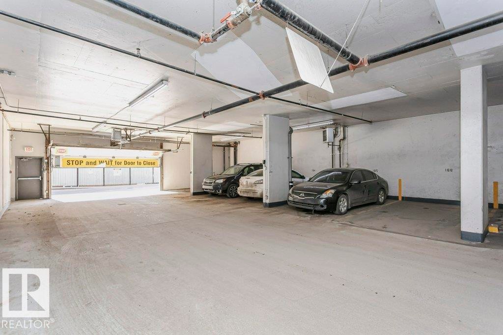 103 9819 104 Street, Edmonton, AB - Indoor Photo Showing Garage