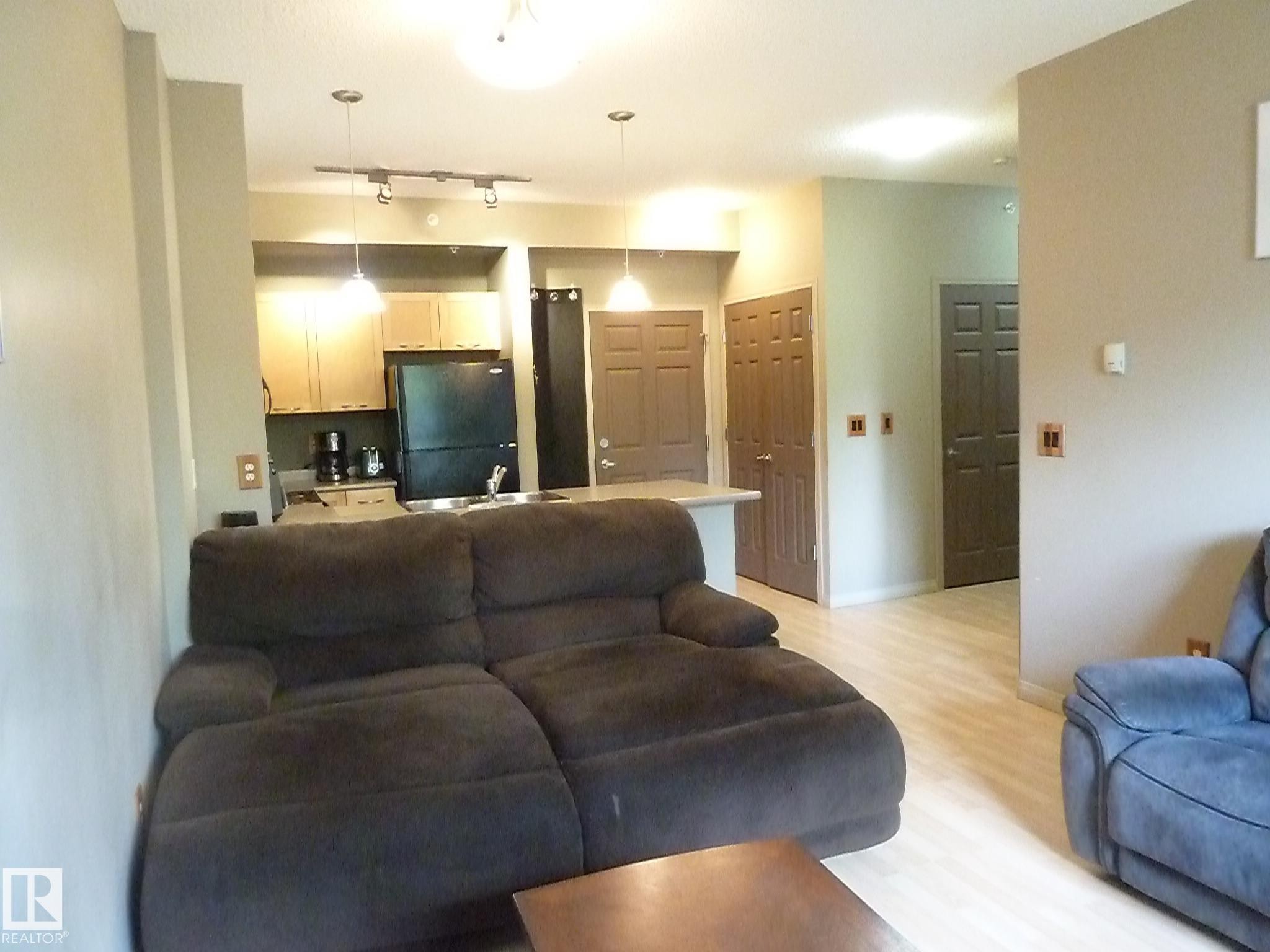 1-104 4245 139 Avenue, Edmonton, AB - Indoor Photo Showing Living Room
