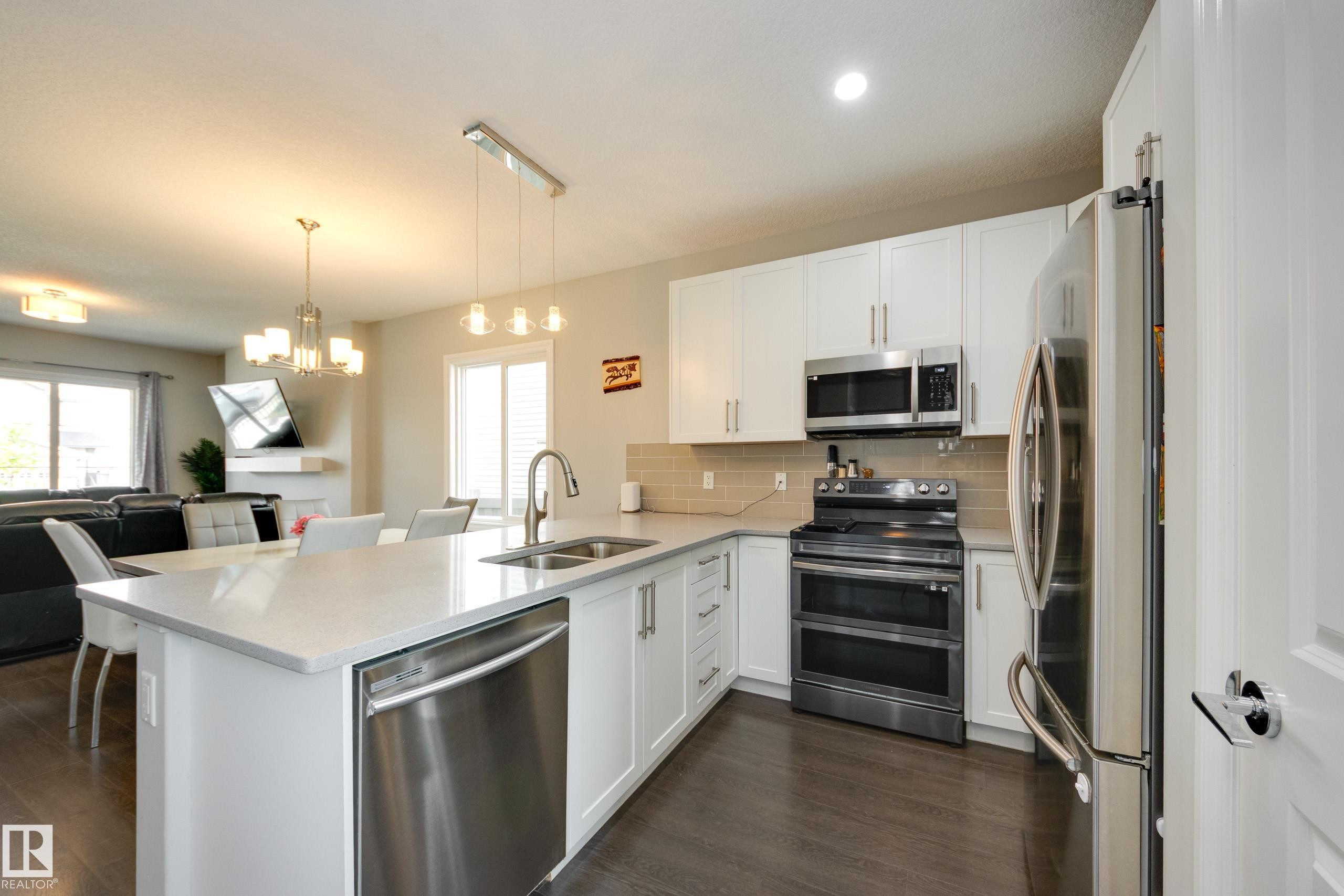 6687 Cardinal Road, Edmonton, AB - Indoor Photo Showing Kitchen With Double Sink
