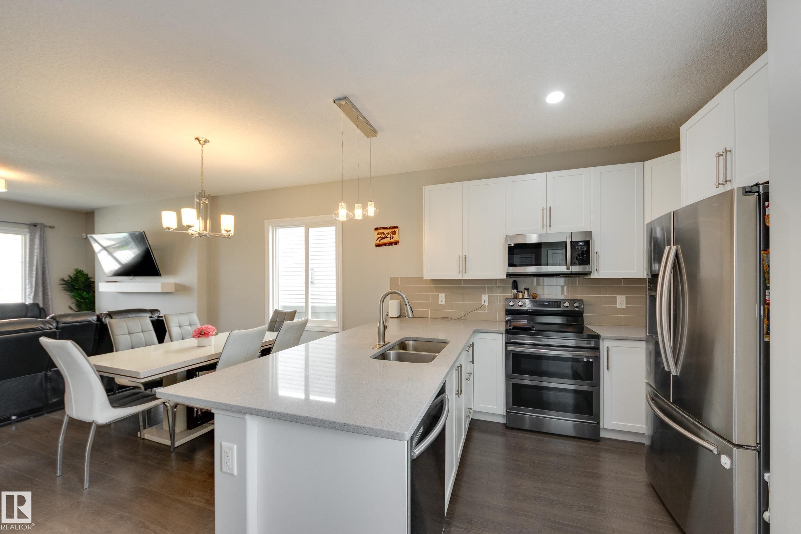 6687 Cardinal Road, Edmonton, AB - Indoor Photo Showing Kitchen With Double Sink