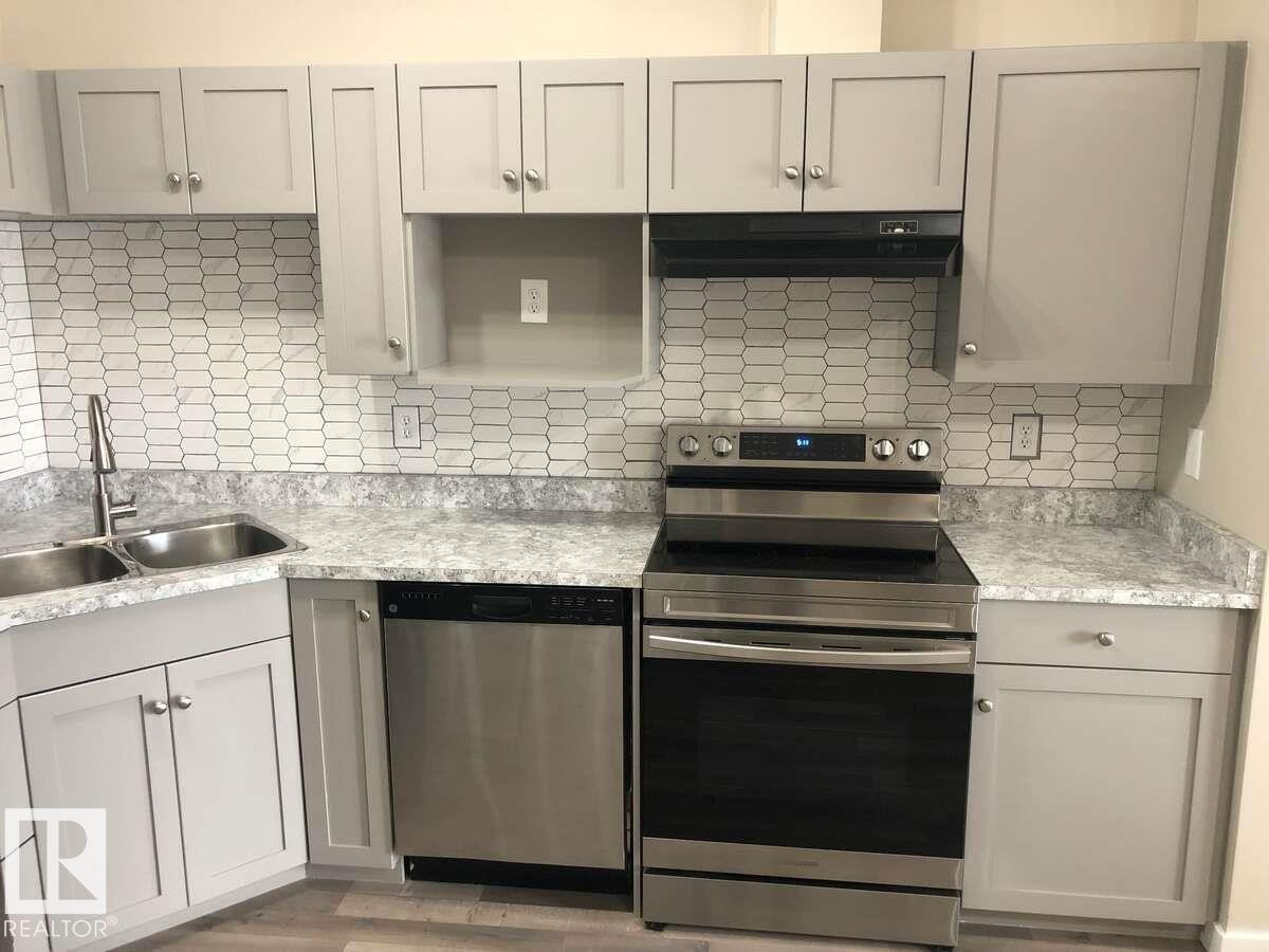 405 151 Edwards Drive, Edmonton, AB - Indoor Photo Showing Kitchen With Double Sink With Upgraded Kitchen