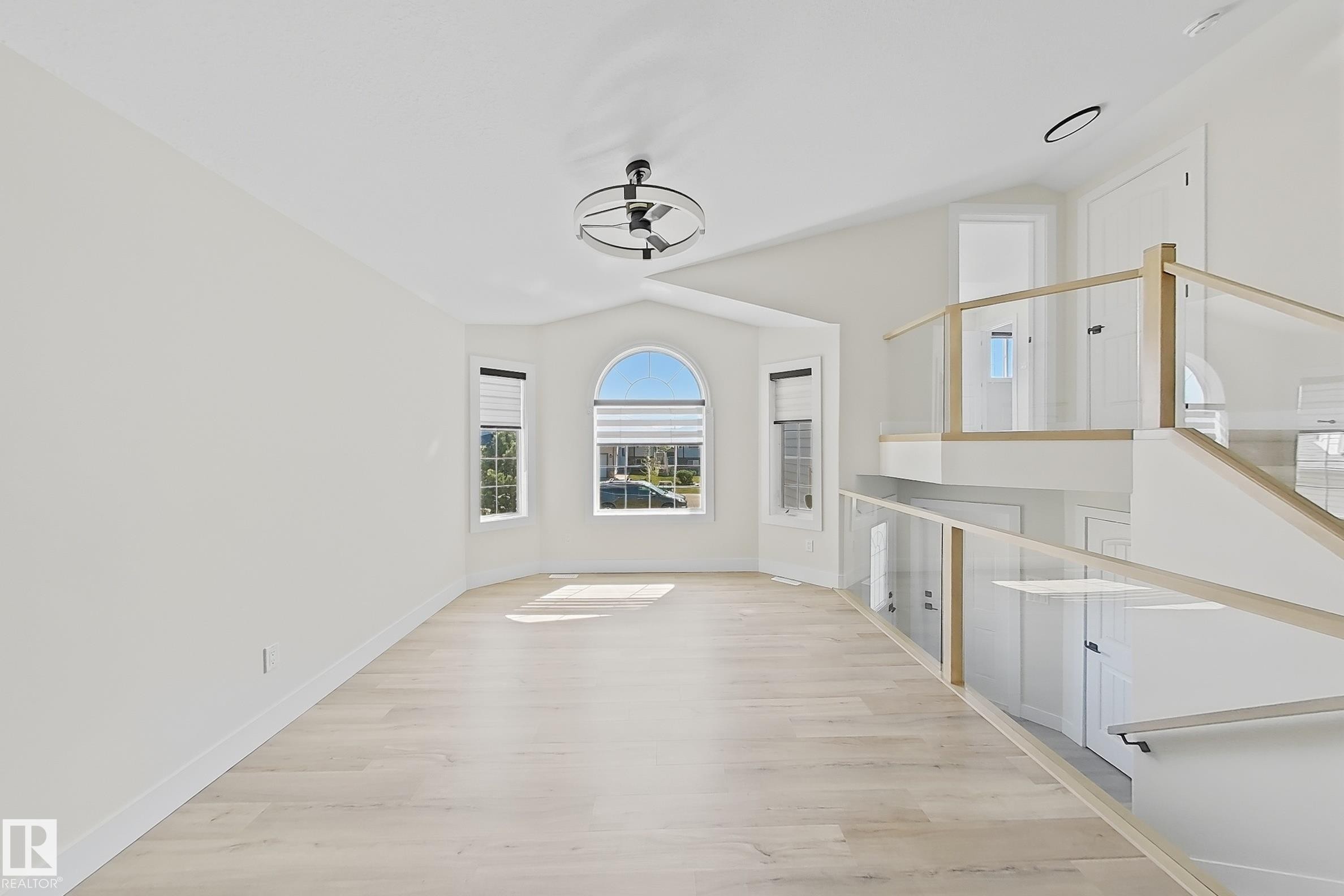 Bright, open interior space featuring light wood-finish flooring - 6144 166 Avenue, Edmonton, AB