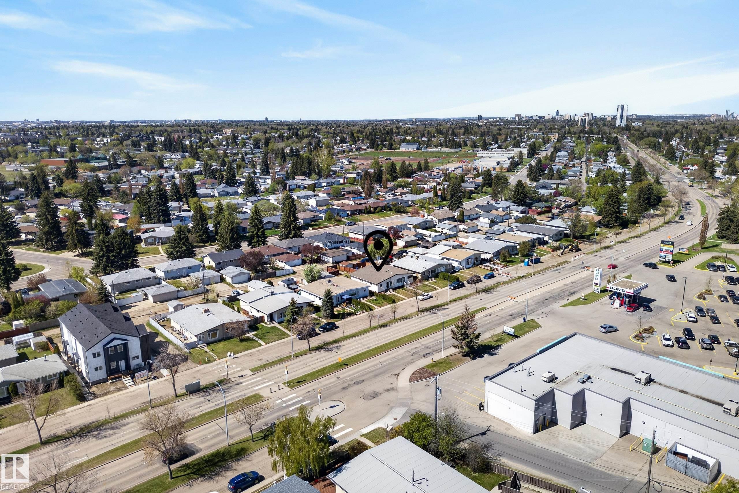 Aerial perspective showcasing the property within a developed neighborhood - 6203 90 Avenue, Edmonton, AB