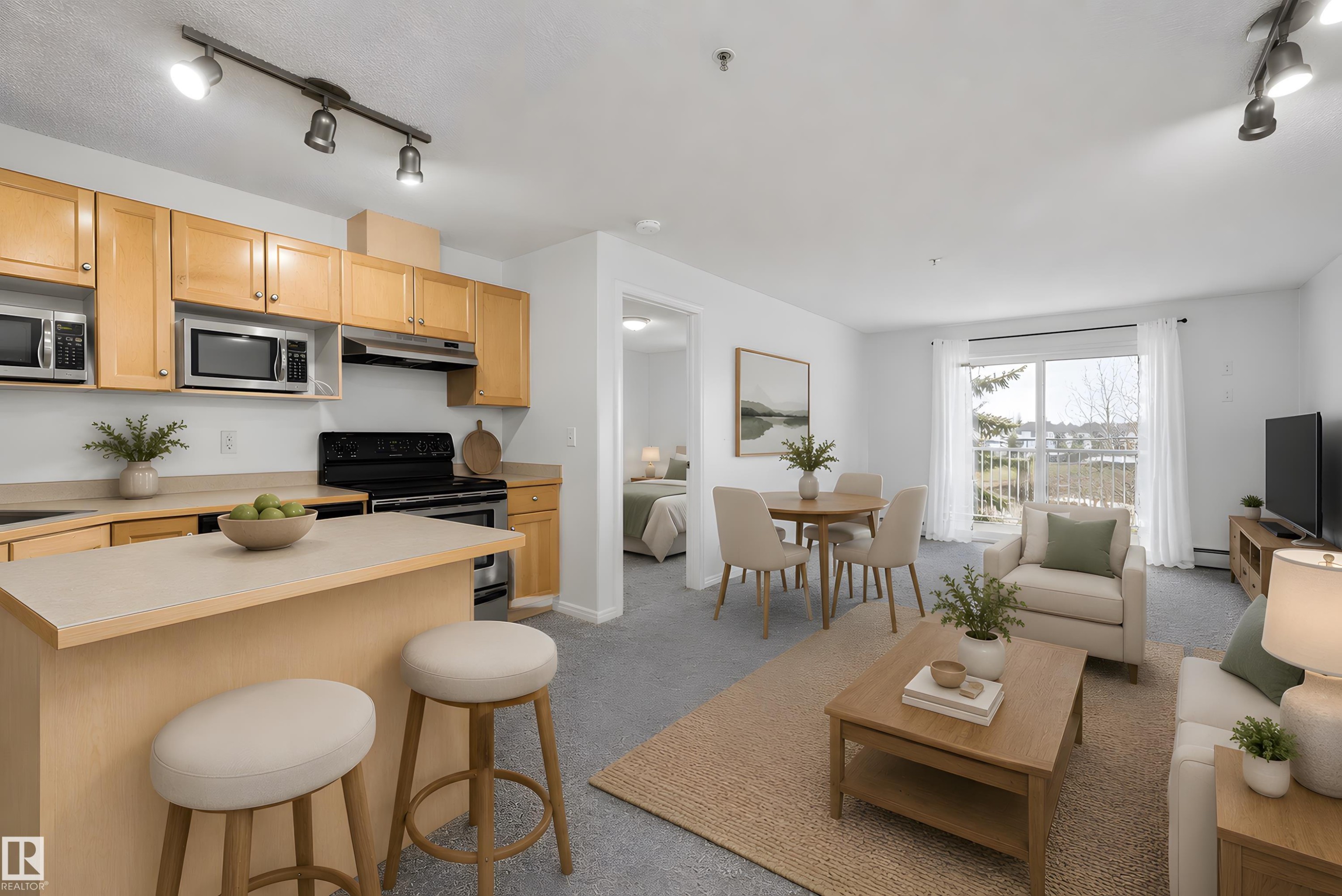 Open-concept living area featuring a kitchen, dining space, and living room - 320 245 Edwards Drive, Edmonton, AB