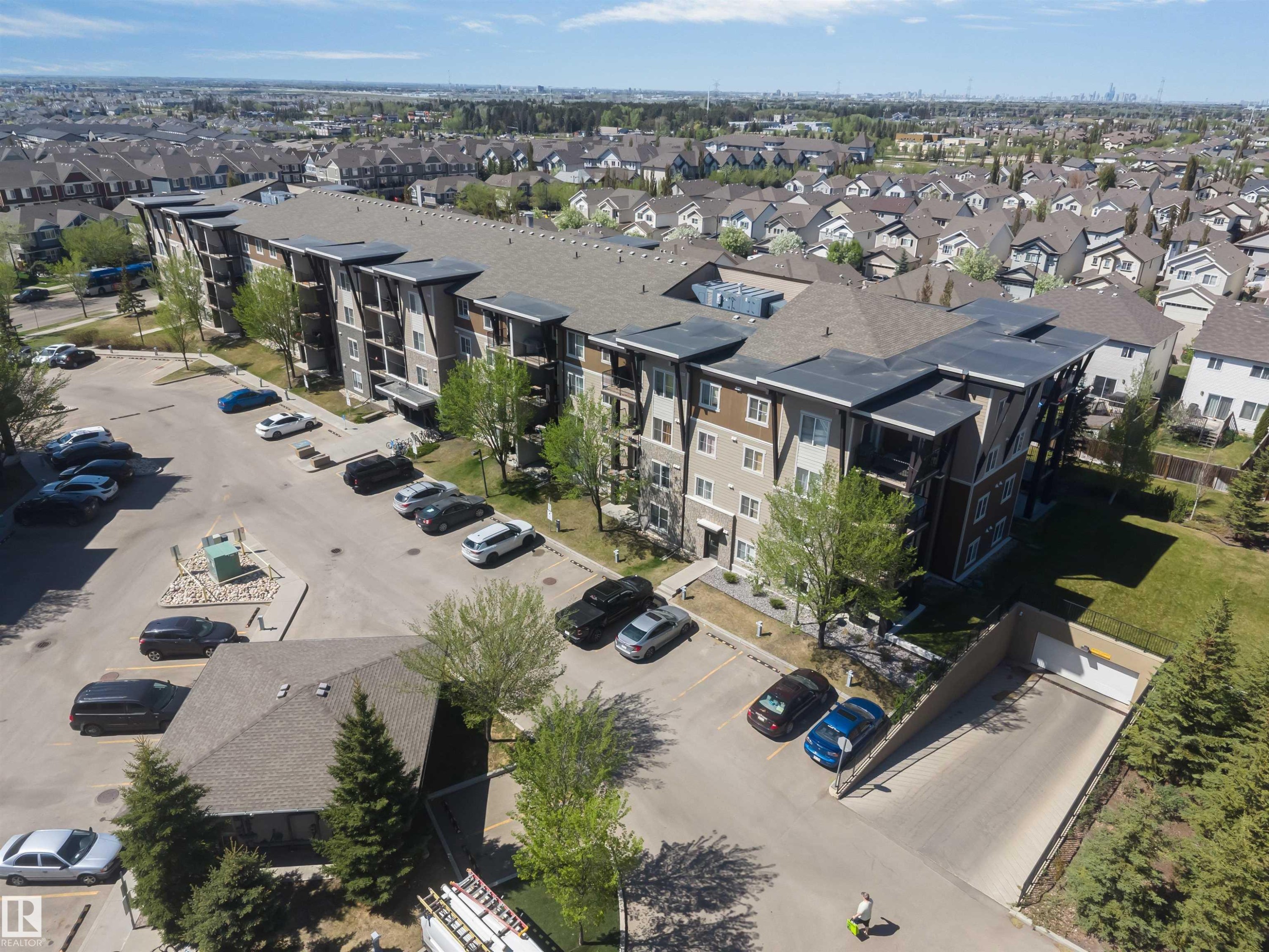 Multi-story building featuring a contemporary facade with varying paneling and private balconies - 320 534 Watt Boulevard, Edmonton, AB - Outdoor With View