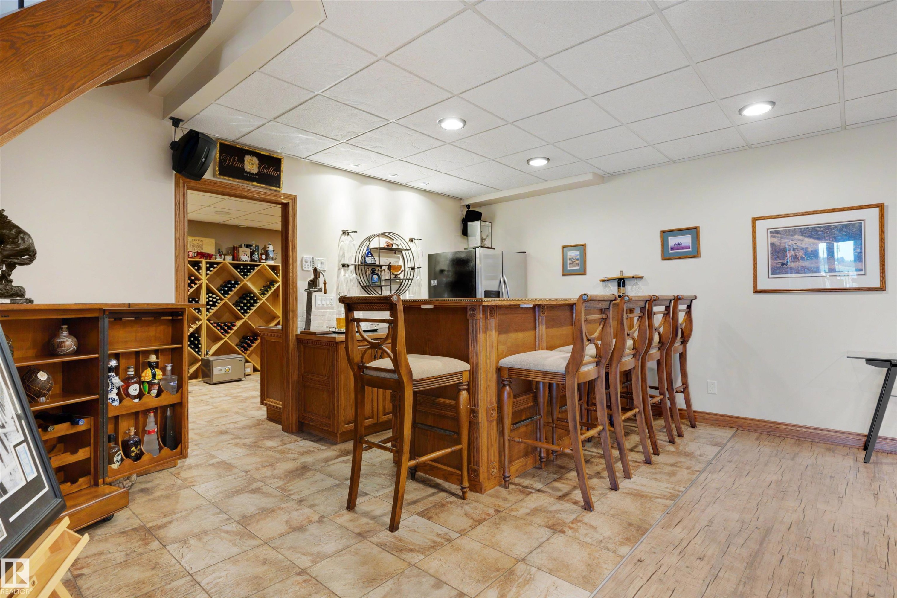 Custom bar with seating for five, recessed lighting, and a drop ceiling - 28125 Highway 587, Rural Red Deer County, AB - Indoor Photo Showing Dining Room