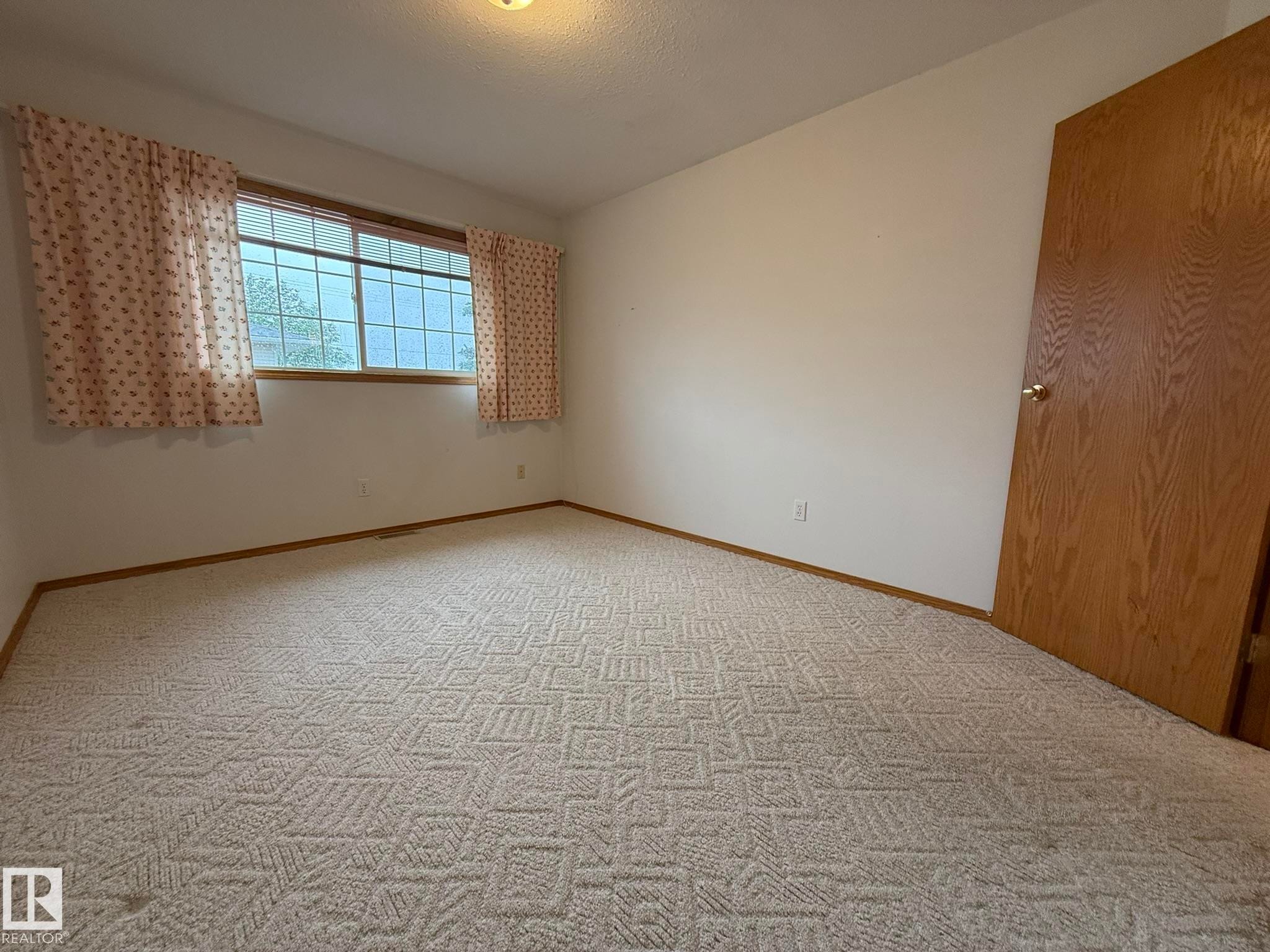 ANOTHER PHOTO OF THE MAIN FLOOR 2nd BEDROOM! - 102 4610 50 Avenue, Stony Plain, AB