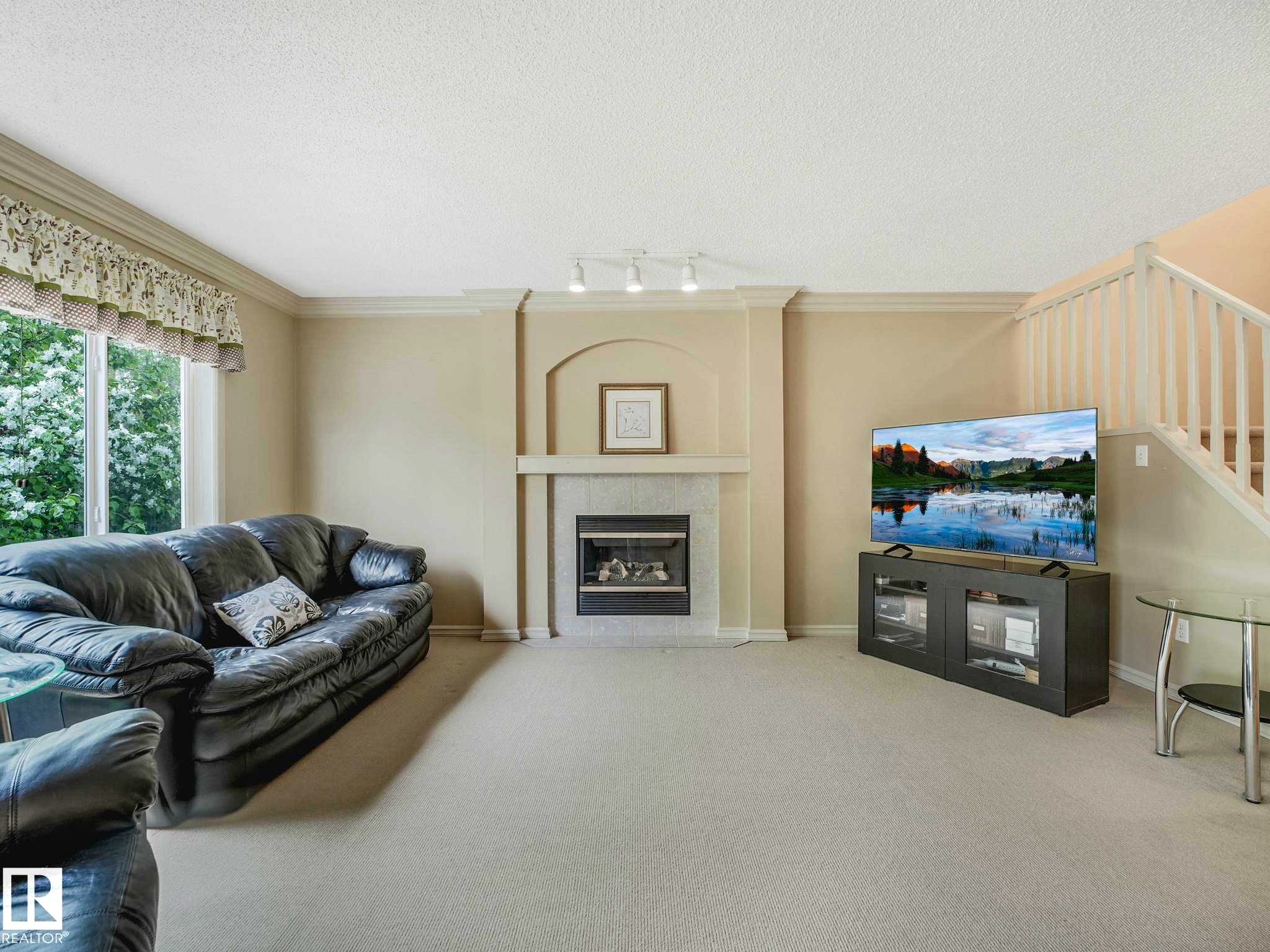 Image quality insufficient for description - 1116 Lincoln Crescent, Edmonton, AB - Indoor Photo Showing Living Room With Fireplace