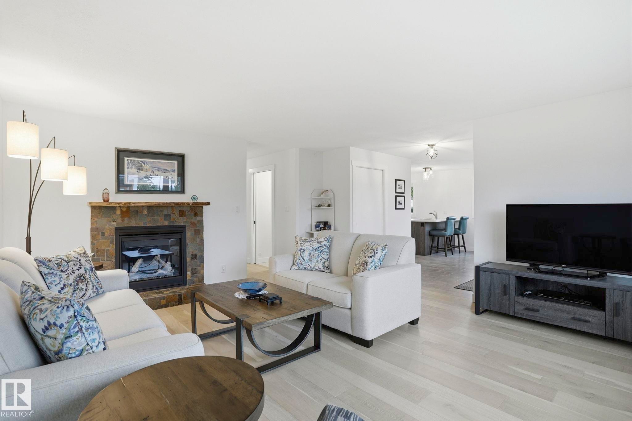 4502 53 Avenue, Leduc, AB - Indoor Photo Showing Living Room With Fireplace