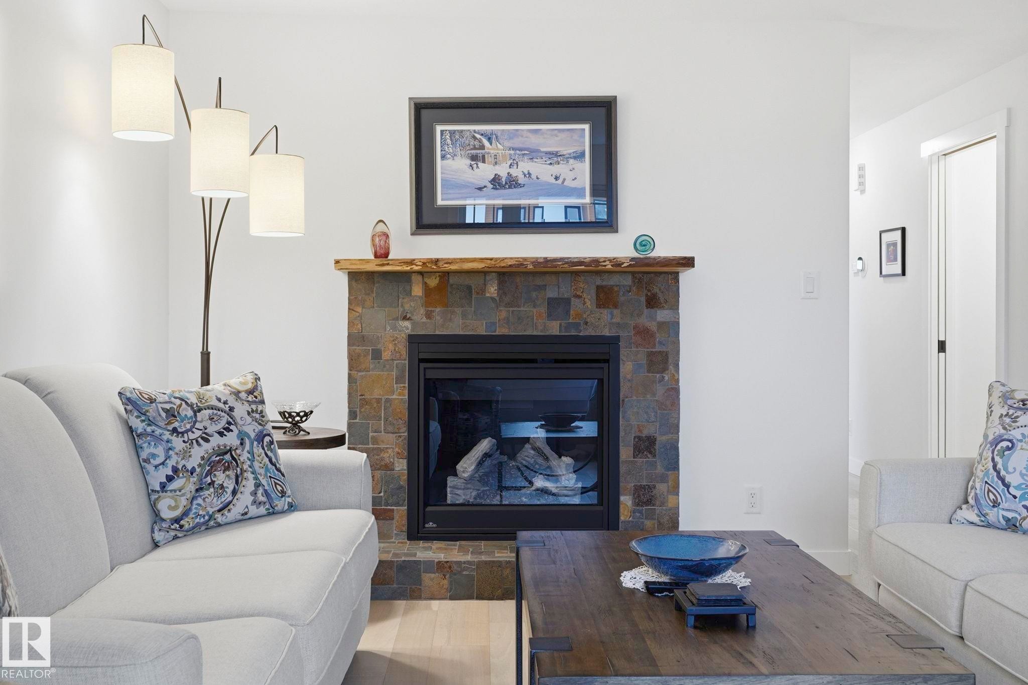 4502 53 Avenue, Leduc, AB - Indoor Photo Showing Living Room With Fireplace