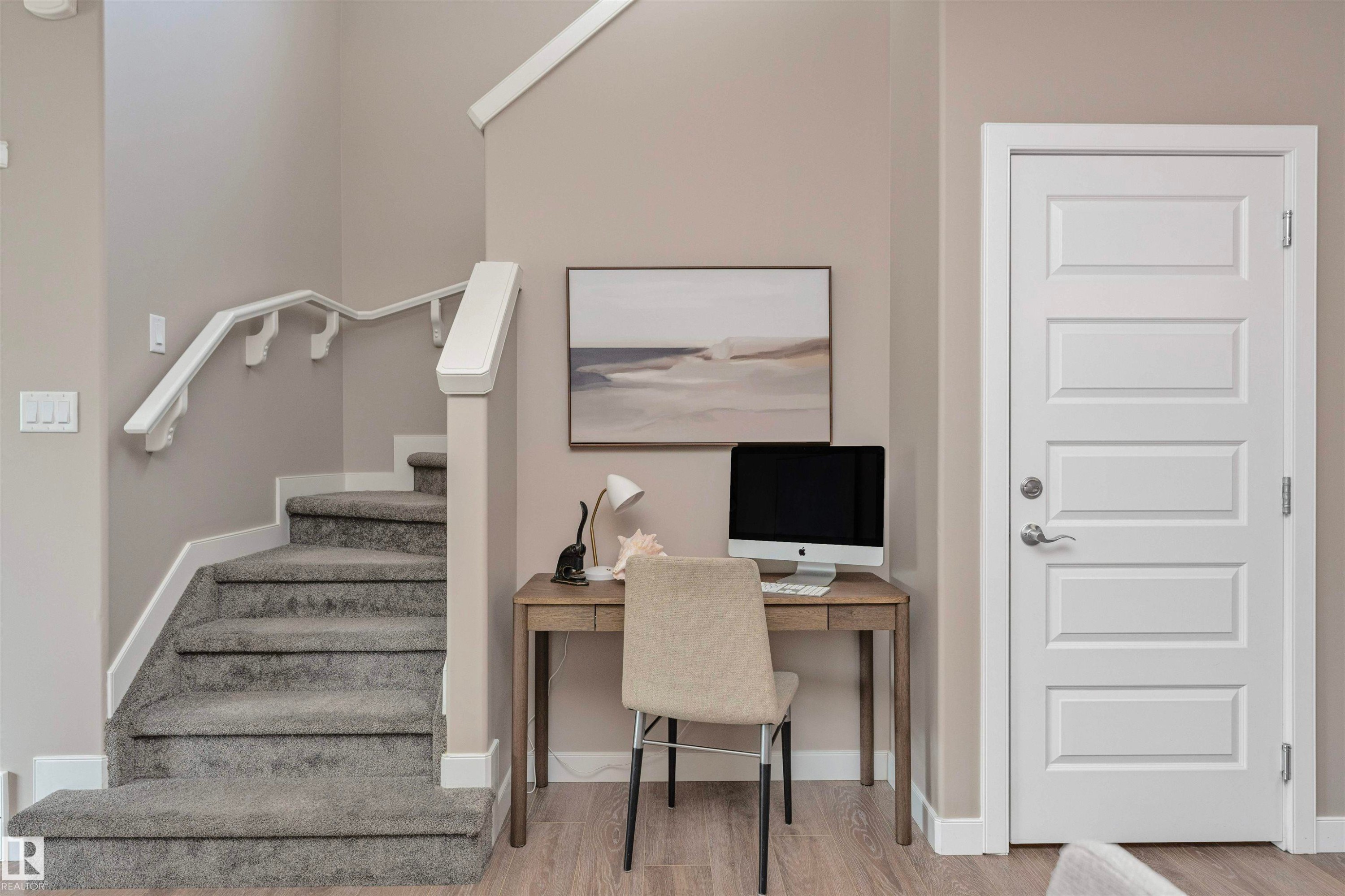 Staircase featuring gray carpet treads and a white painted handrail - 22124 85 Avenue Nw, Edmonton, AB - Indoor Photo Showing Other Room