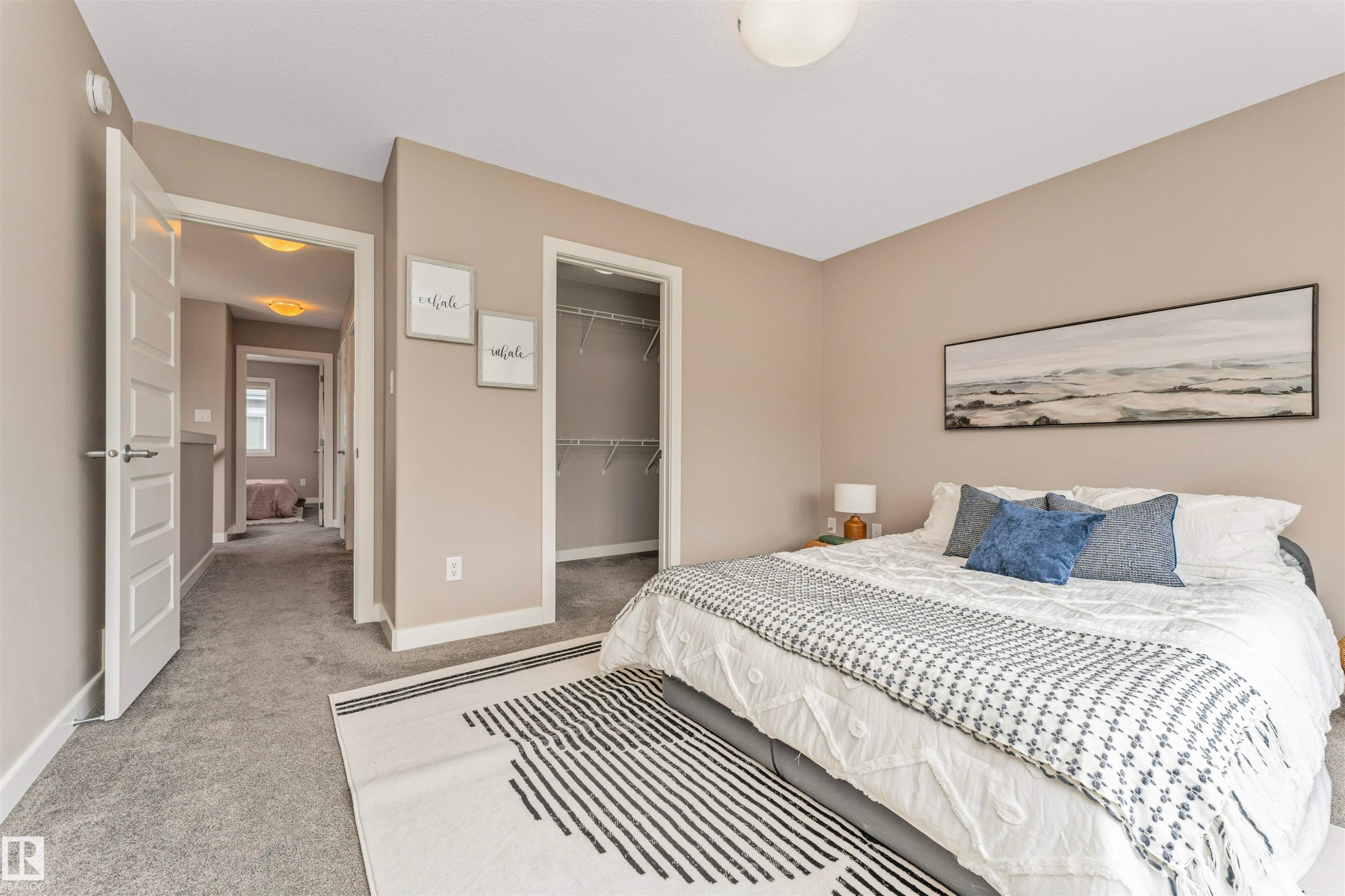 Carpeted room with a ceiling-mounted light fixture - 22124 85 Avenue Nw, Edmonton, AB - Indoor Photo Showing Bedroom