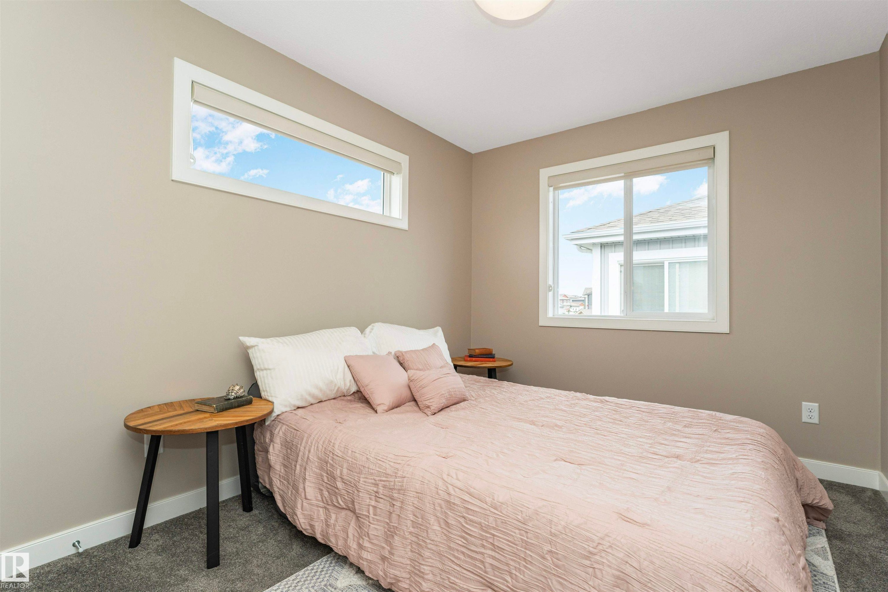 Room featuring neutral wall tones, white trim, and a low-pile carpet - 22124 85 Avenue Nw, Edmonton, AB - Indoor Photo Showing Bedroom