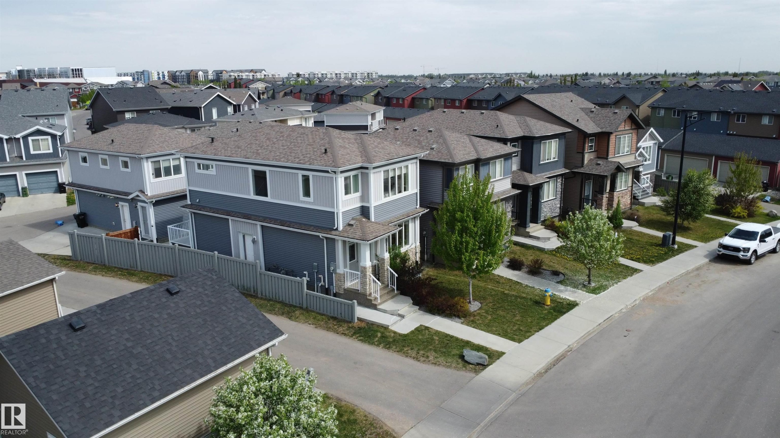Contemporary two-story residence with a covered front porch and dormer window accents - 22124 85 Avenue Nw, Edmonton, AB - Outdoor