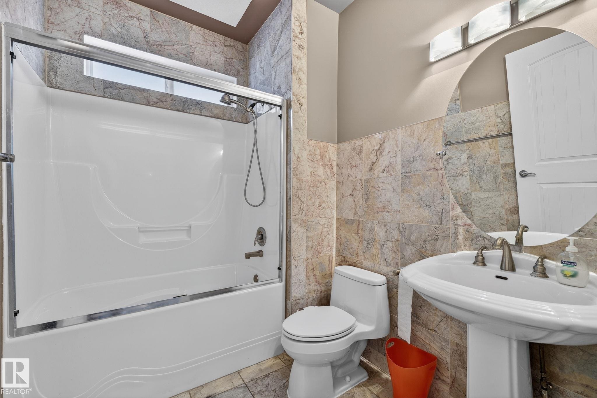 Residential dwelling with attached garage, situated on a curved street - 1508 Palmer Close, Edmonton, AB