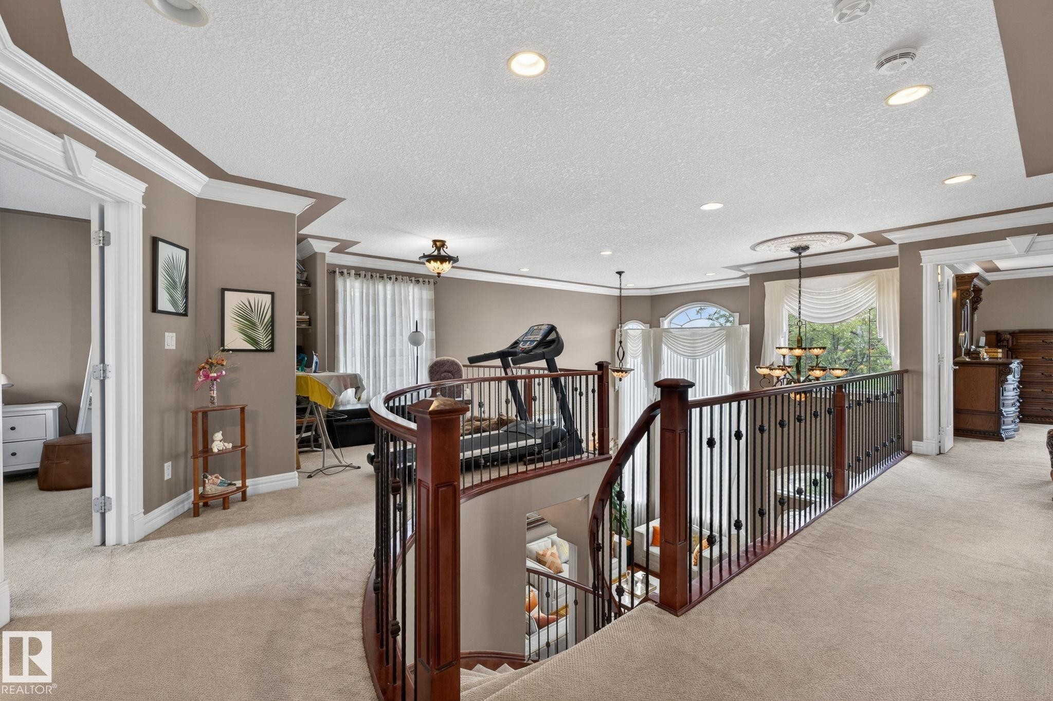 Entry foyer featuring double doors with arched stained glass inserts and a transom window - 1508 Palmer Close, Edmonton, AB