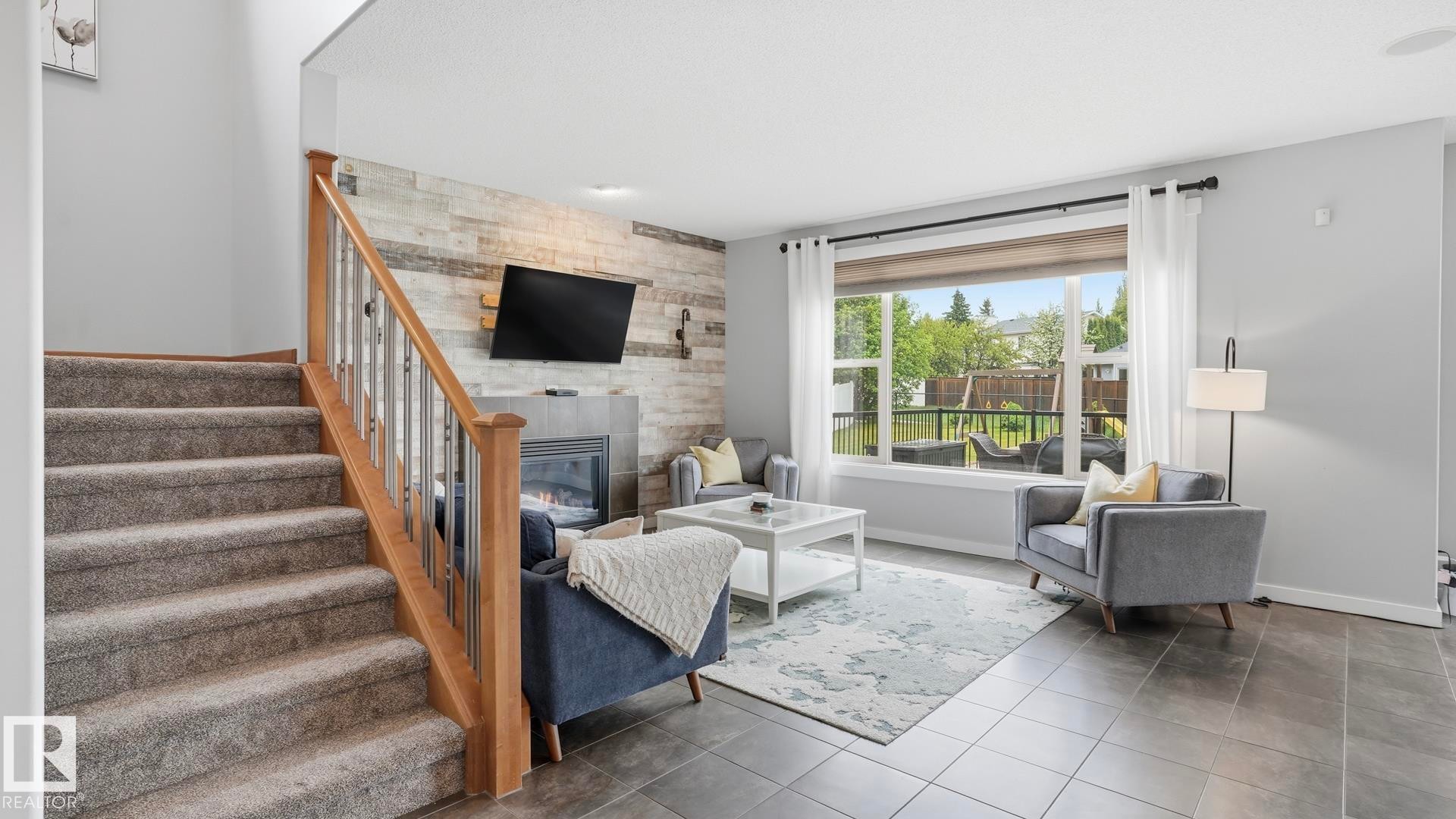 75 Rue Moreau, Beaumont, AB - Indoor Photo Showing Living Room With Fireplace