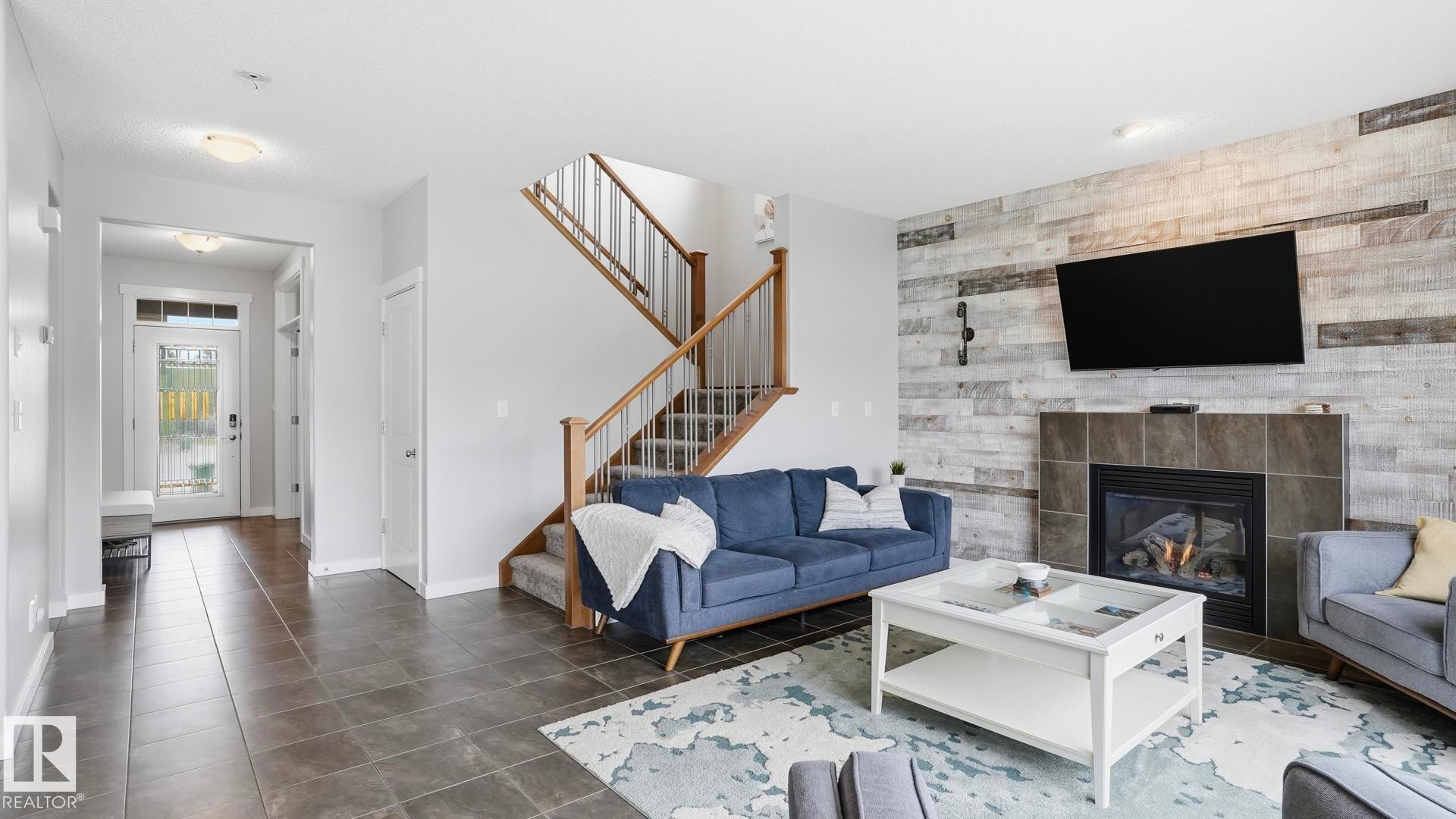 75 Rue Moreau, Beaumont, AB - Indoor Photo Showing Living Room With Fireplace