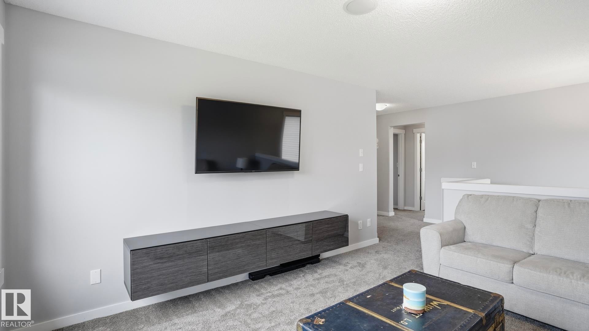 75 Rue Moreau, Beaumont, AB - Indoor Photo Showing Living Room