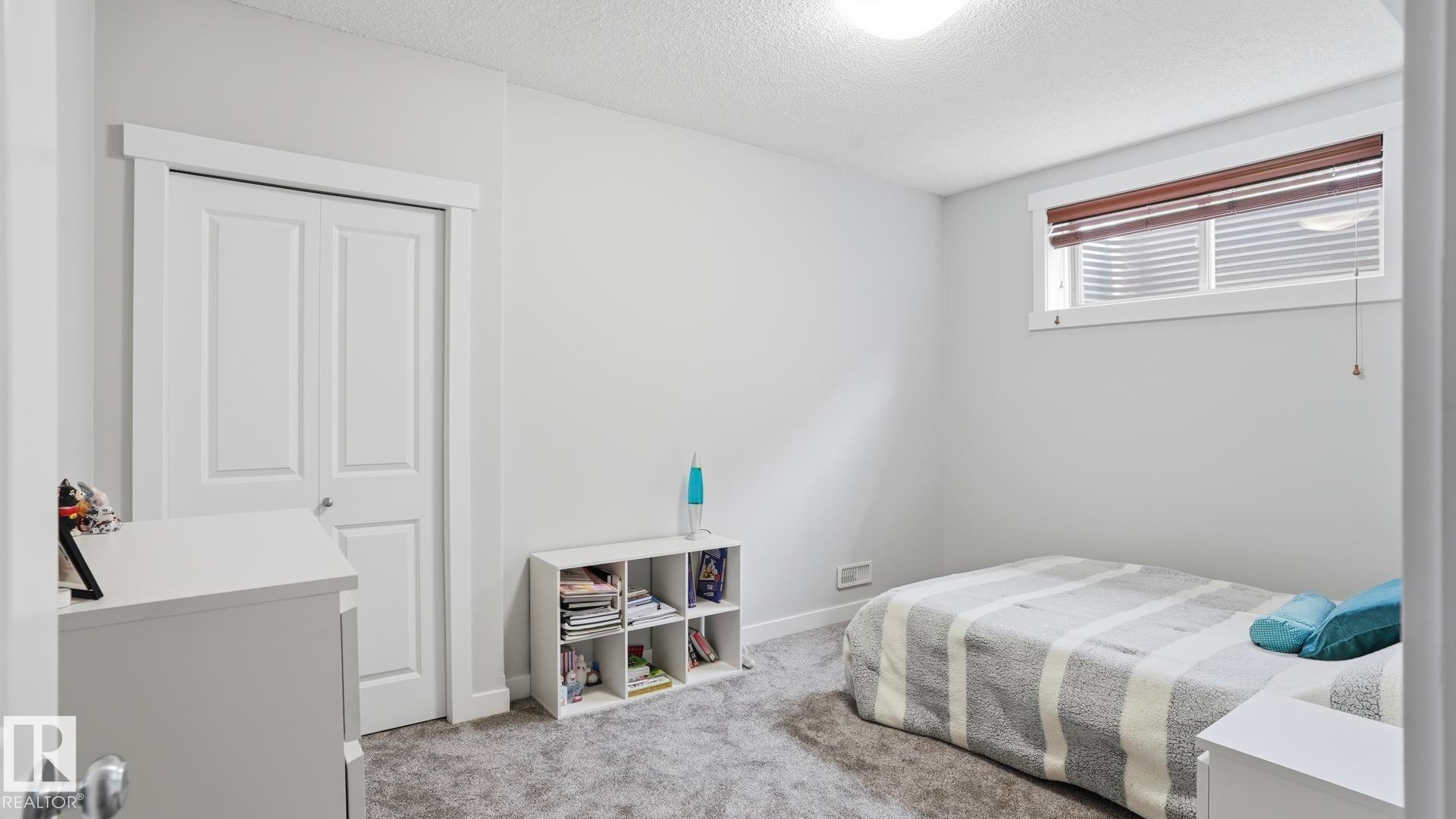 75 Rue Moreau, Beaumont, AB - Indoor Photo Showing Bedroom